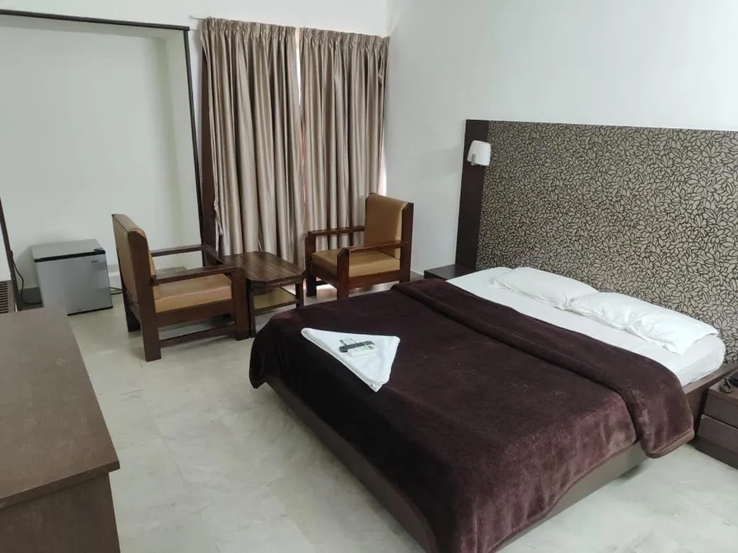 Bed in Hotel Navaratna Palace