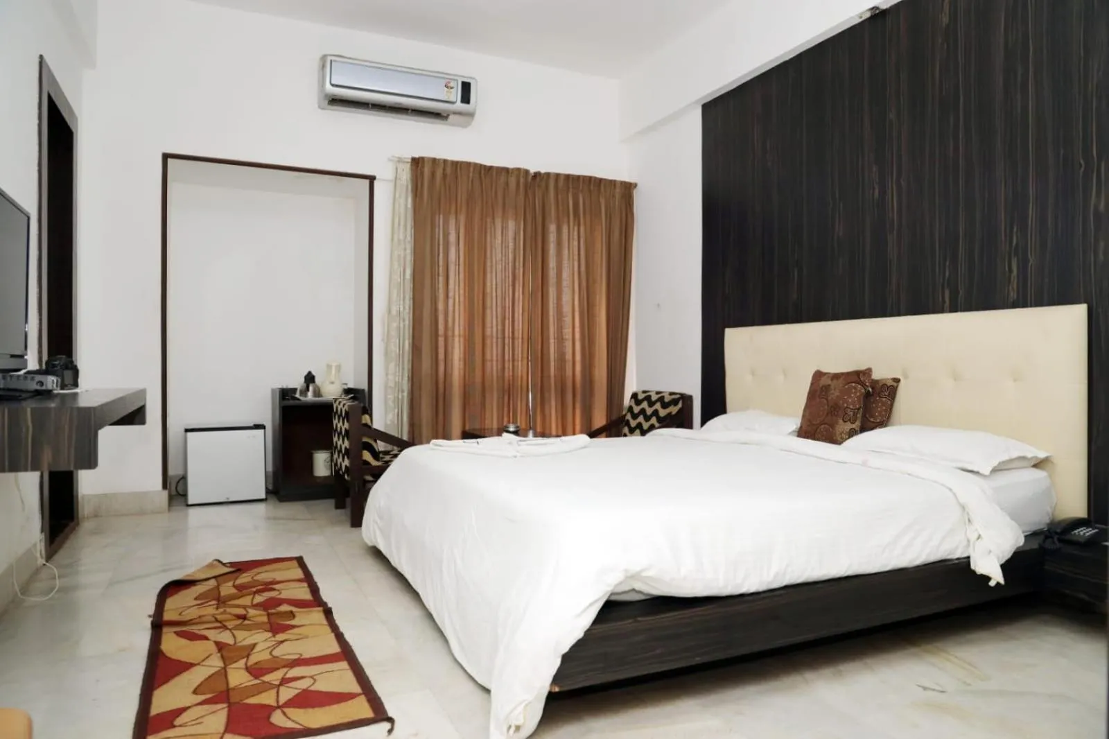 Bed in Hotel Navaratna Palace