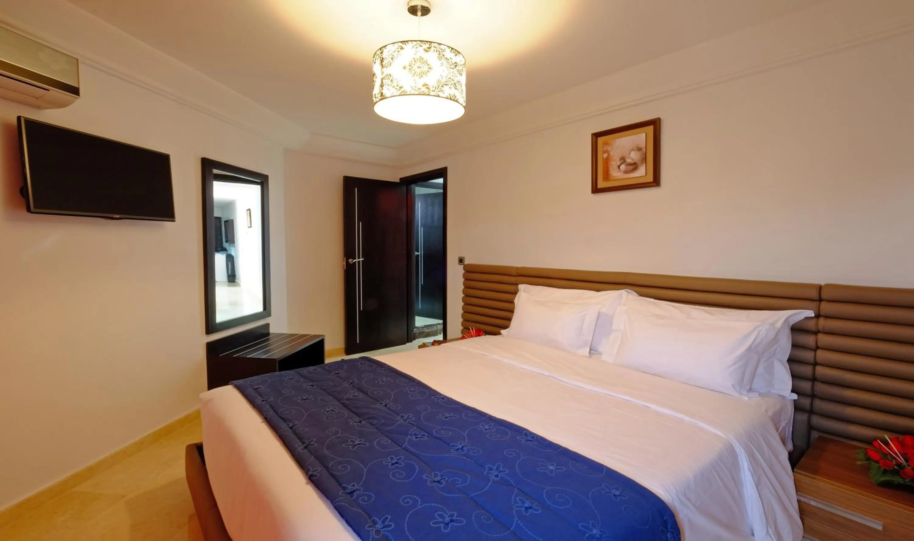 Bed in Appart Hôtel Mouna