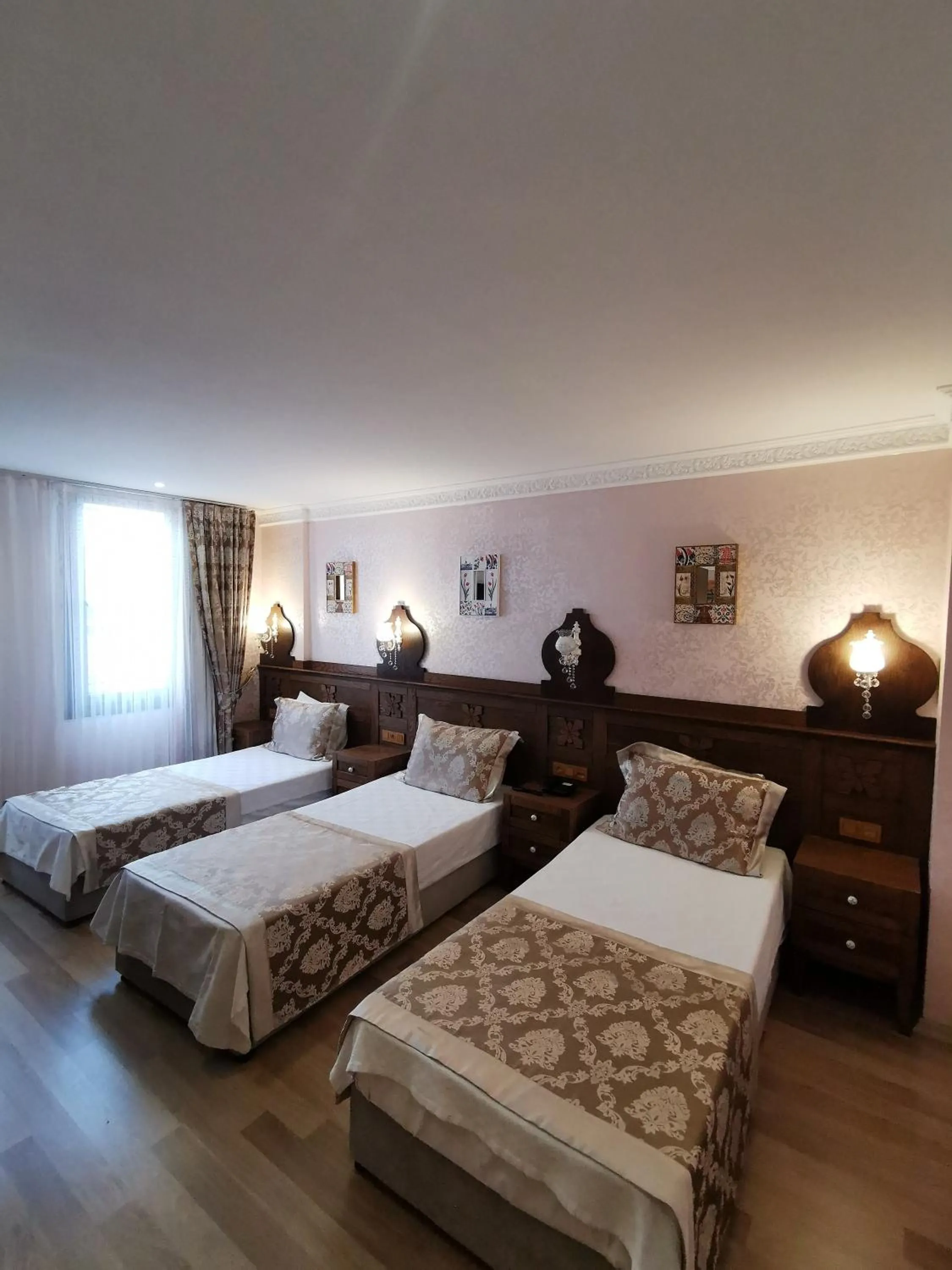 Bed in Perapolis Hotel