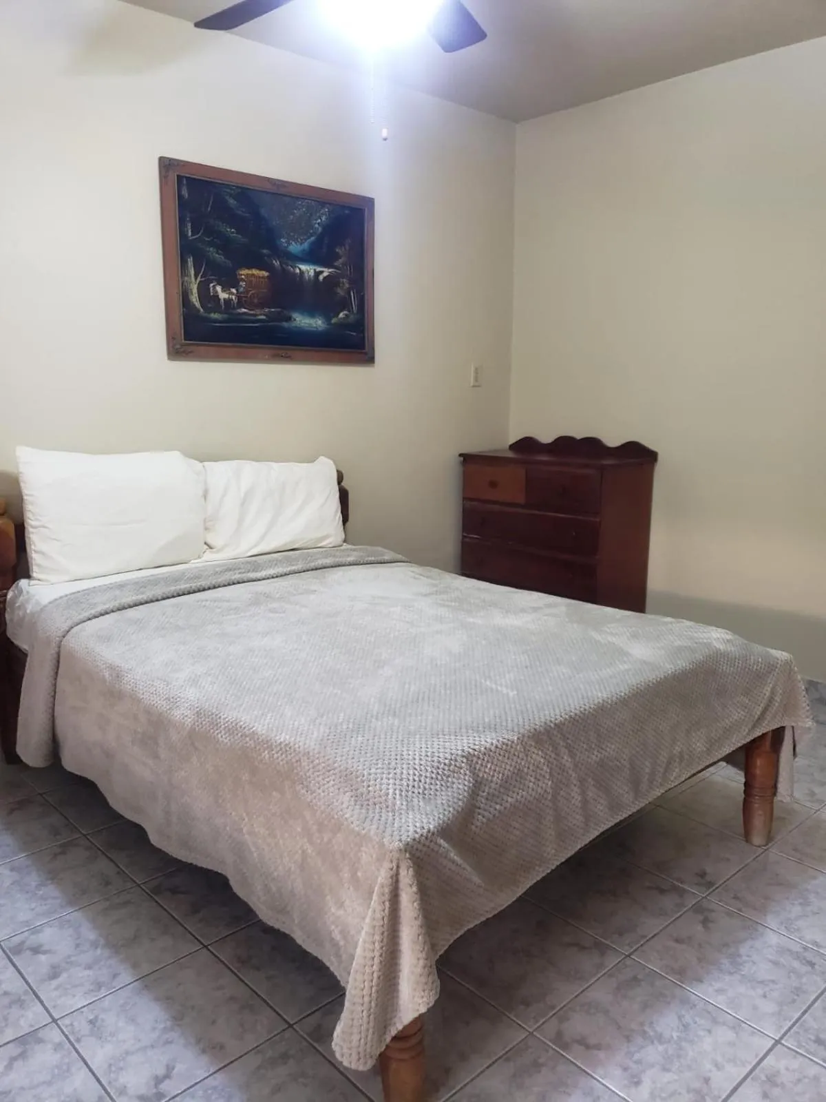 Bed in Beach Side Condos Caye Caulker by CCVH