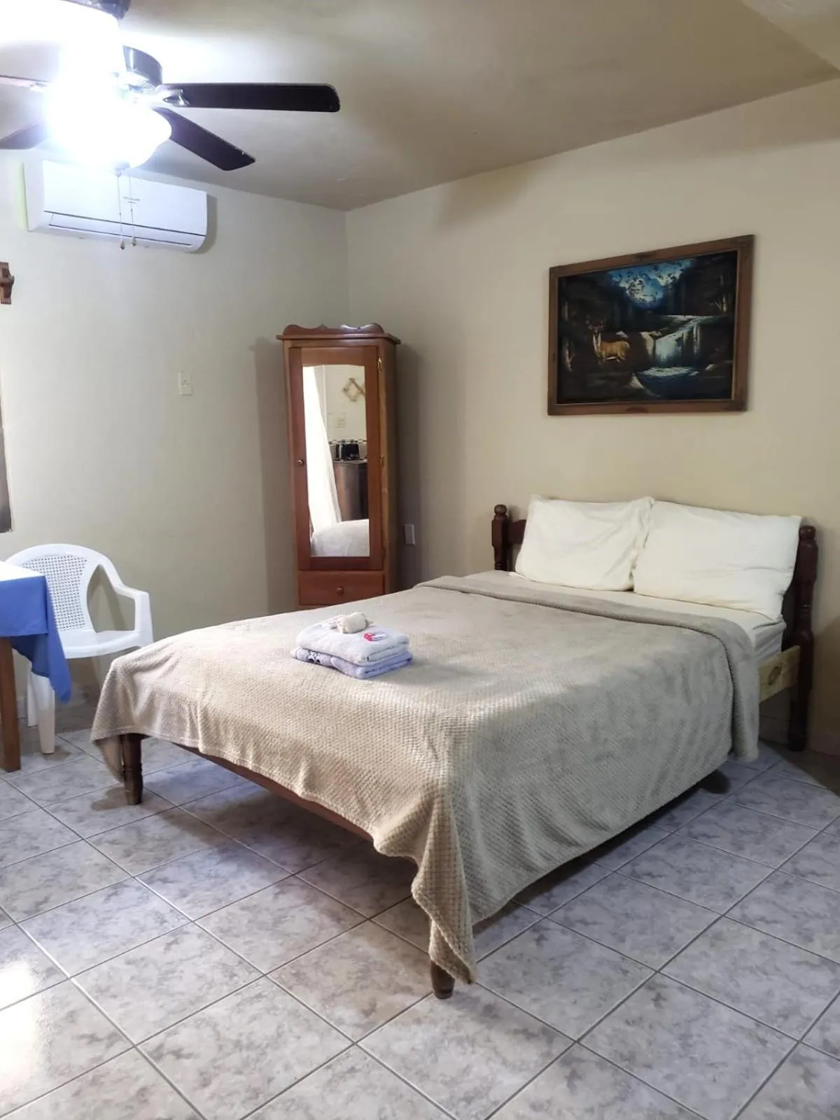 Bed in Beach Side Condos Caye Caulker by CCVH