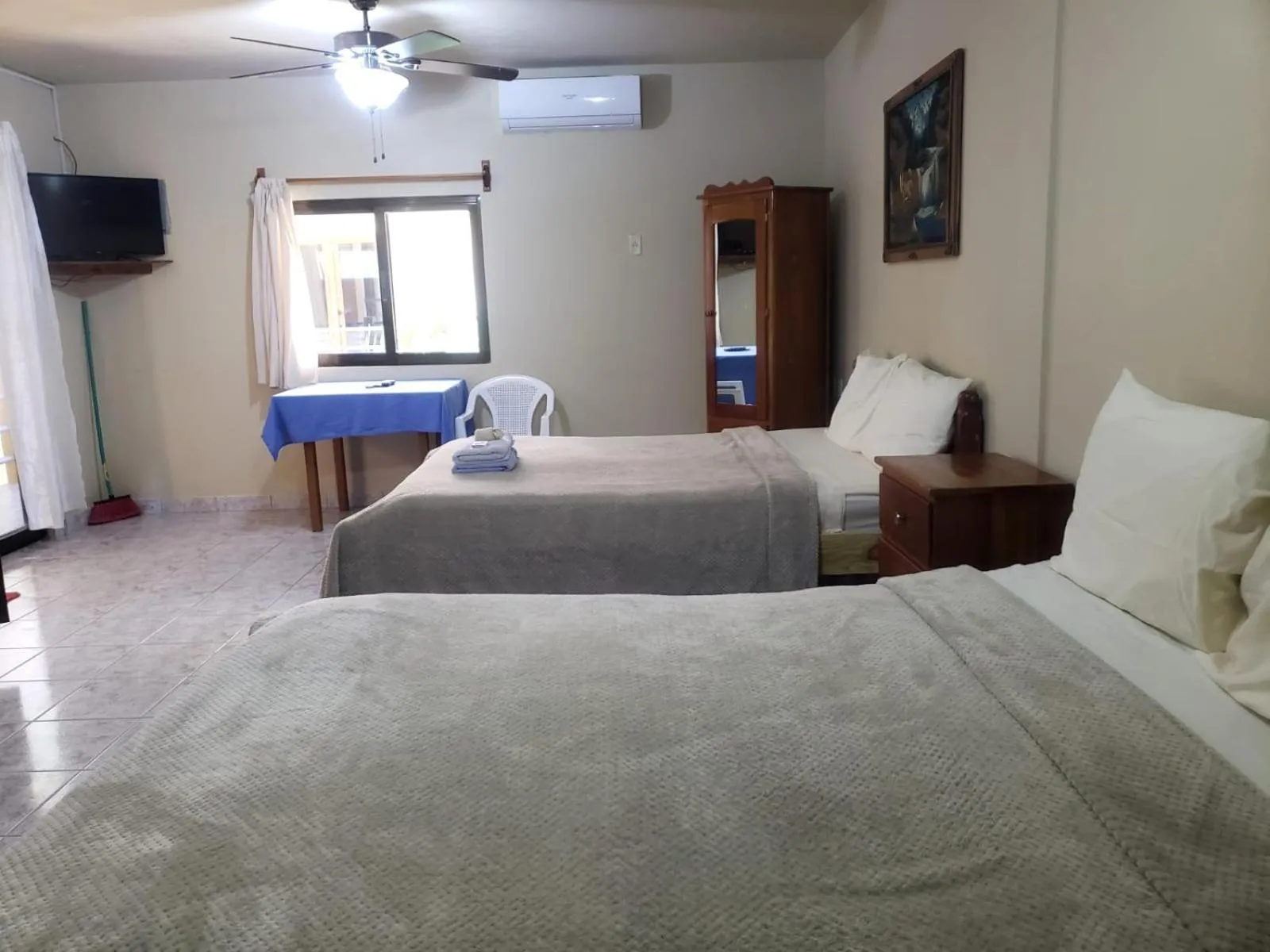 Bed in Beach Side Condos Caye Caulker by CCVH