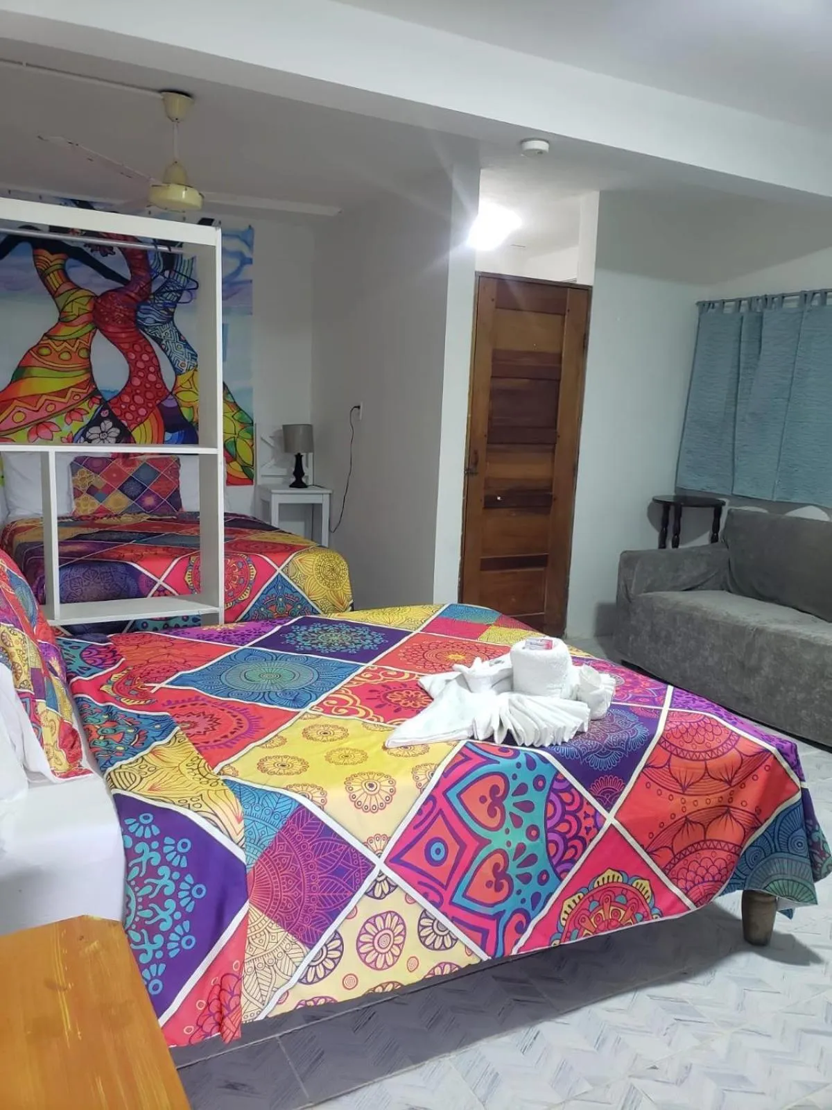 Bed in Beach Side Condos Caye Caulker by CCVH