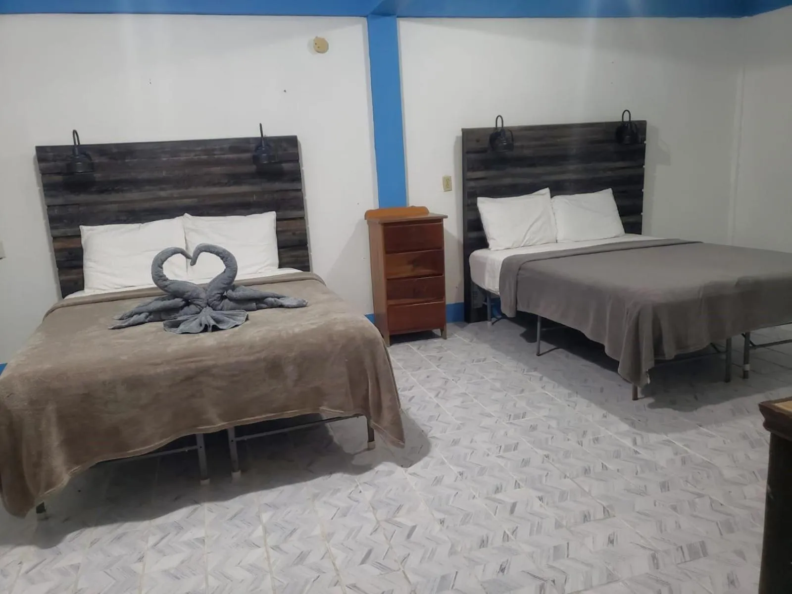 Bed in Beach Side Condos Caye Caulker by CCVH