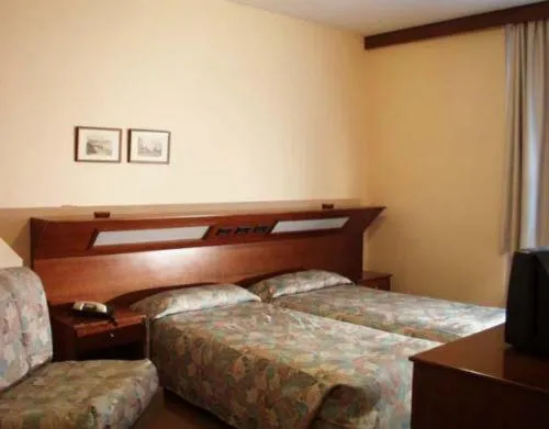 Bed in Hotel Borghetti