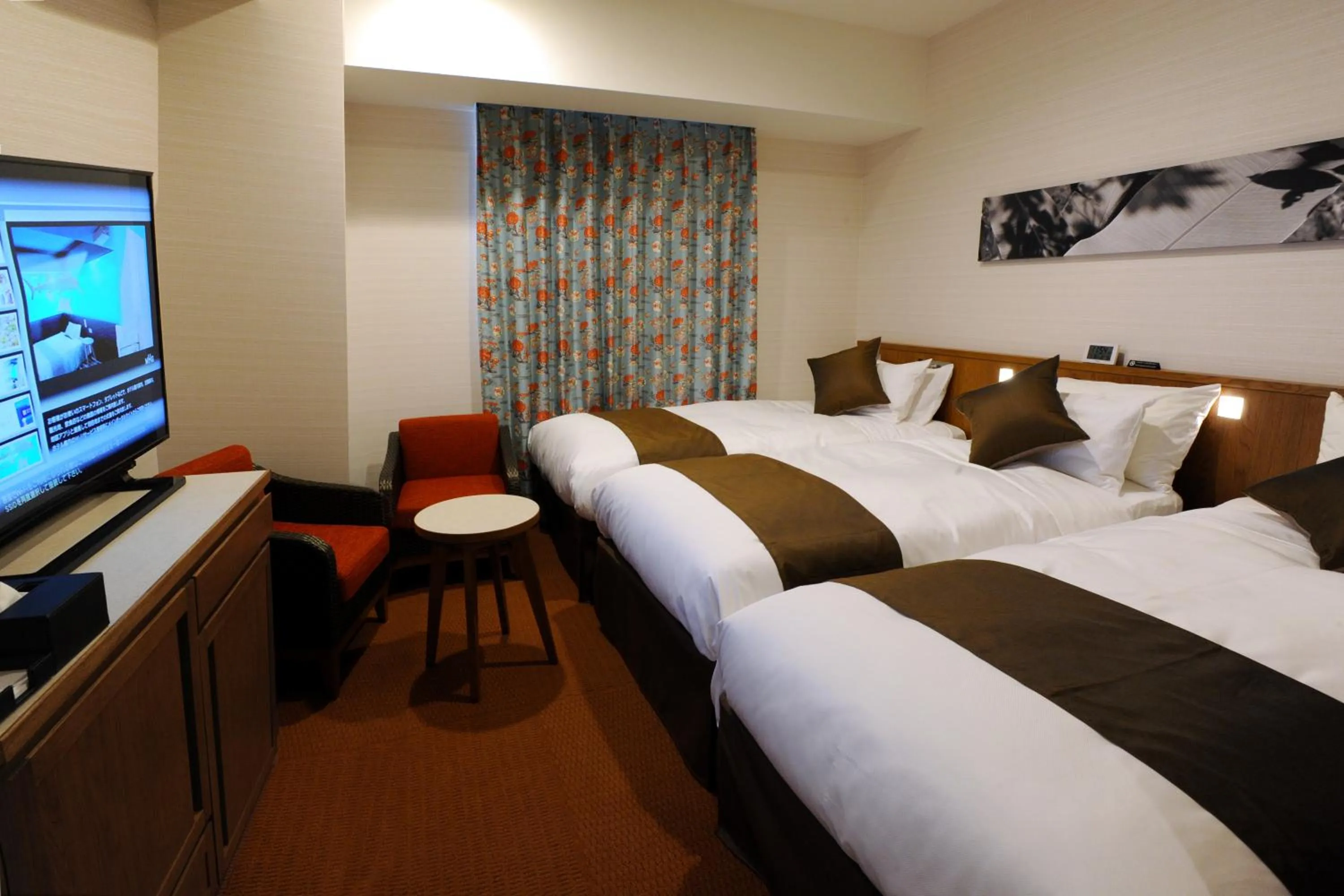 Photo of the whole room, Bed in Hotel Gracery Naha