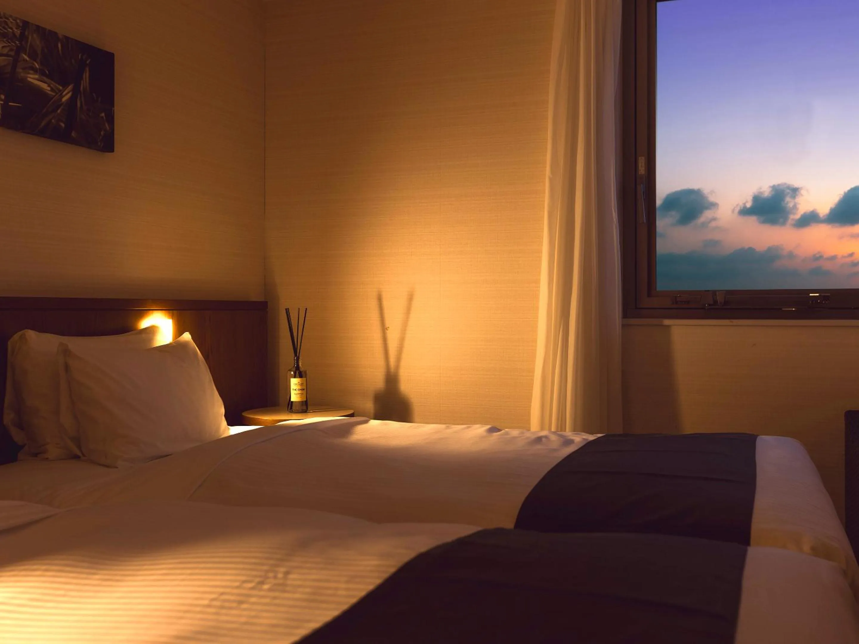 Bed in Hotel Gracery Naha