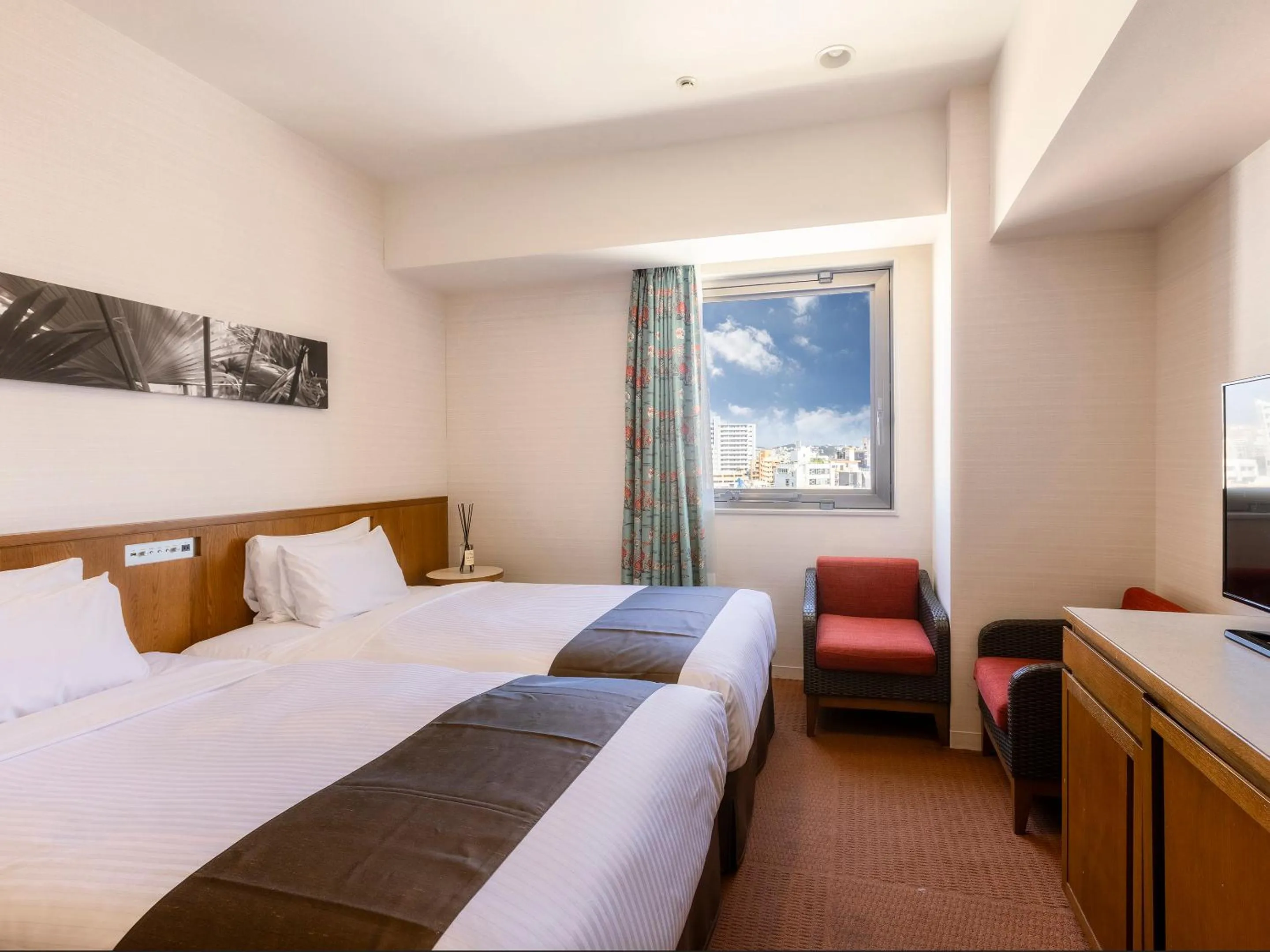 Bed in Hotel Gracery Naha