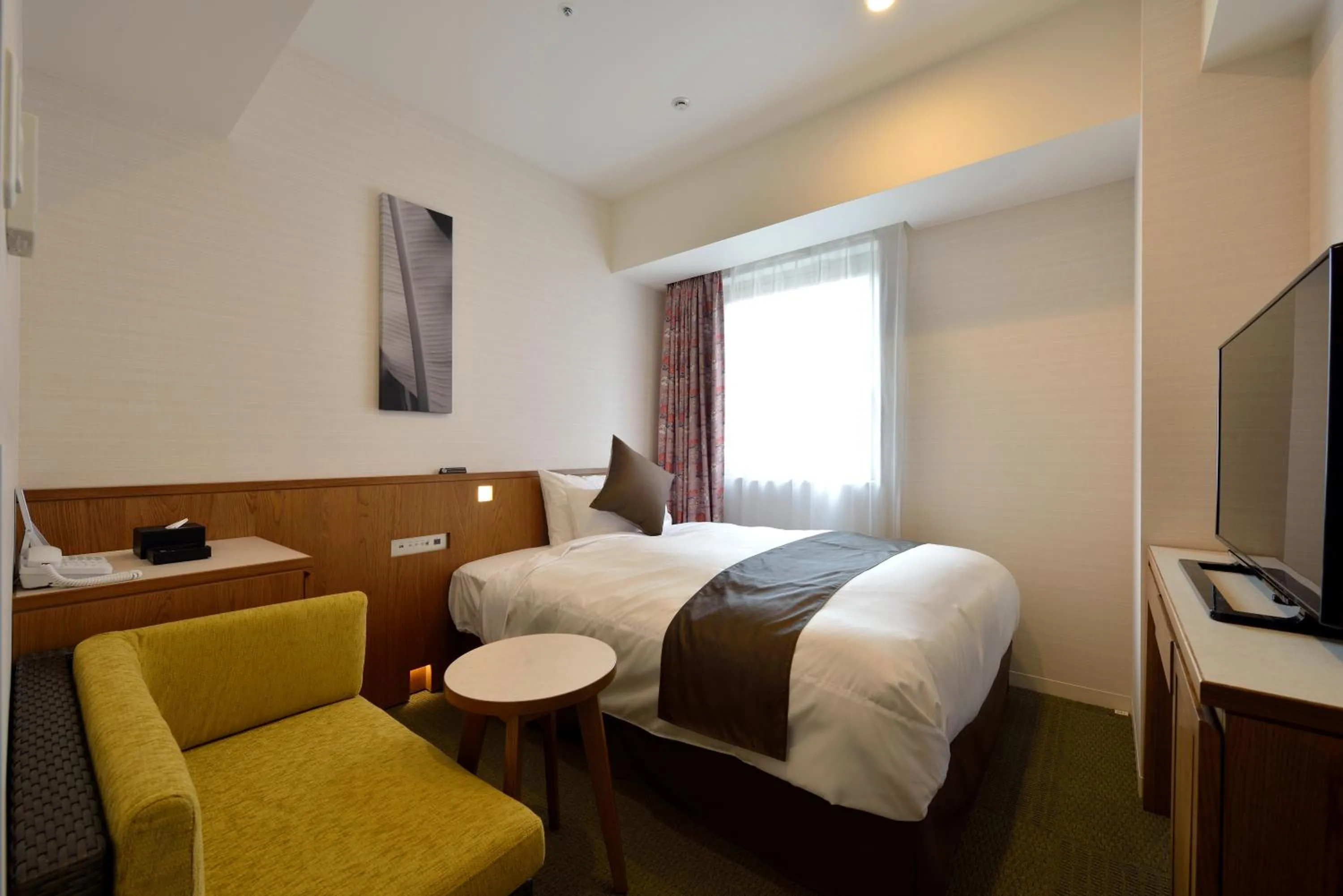 Bed in Hotel Gracery Naha