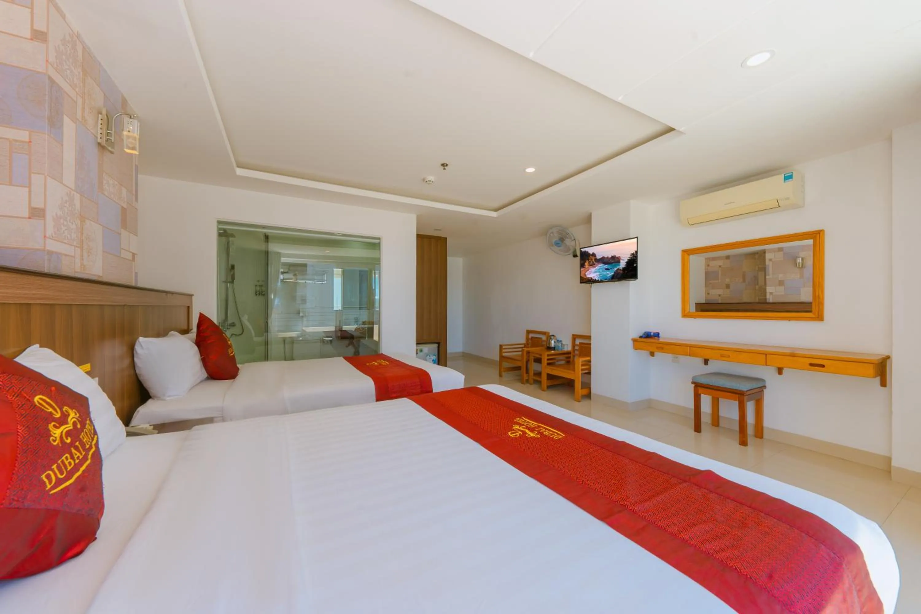 Communal lounge/ TV room, Bed in Dubai Nha Trang Hotel managed by HT