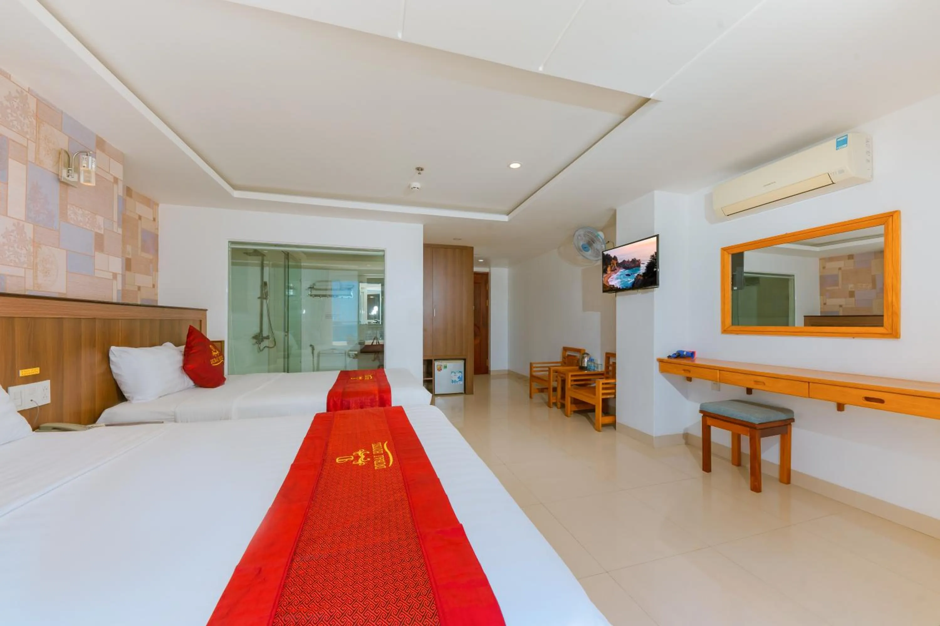 Communal lounge/ TV room, Bed in Dubai Nha Trang Hotel managed by HT
