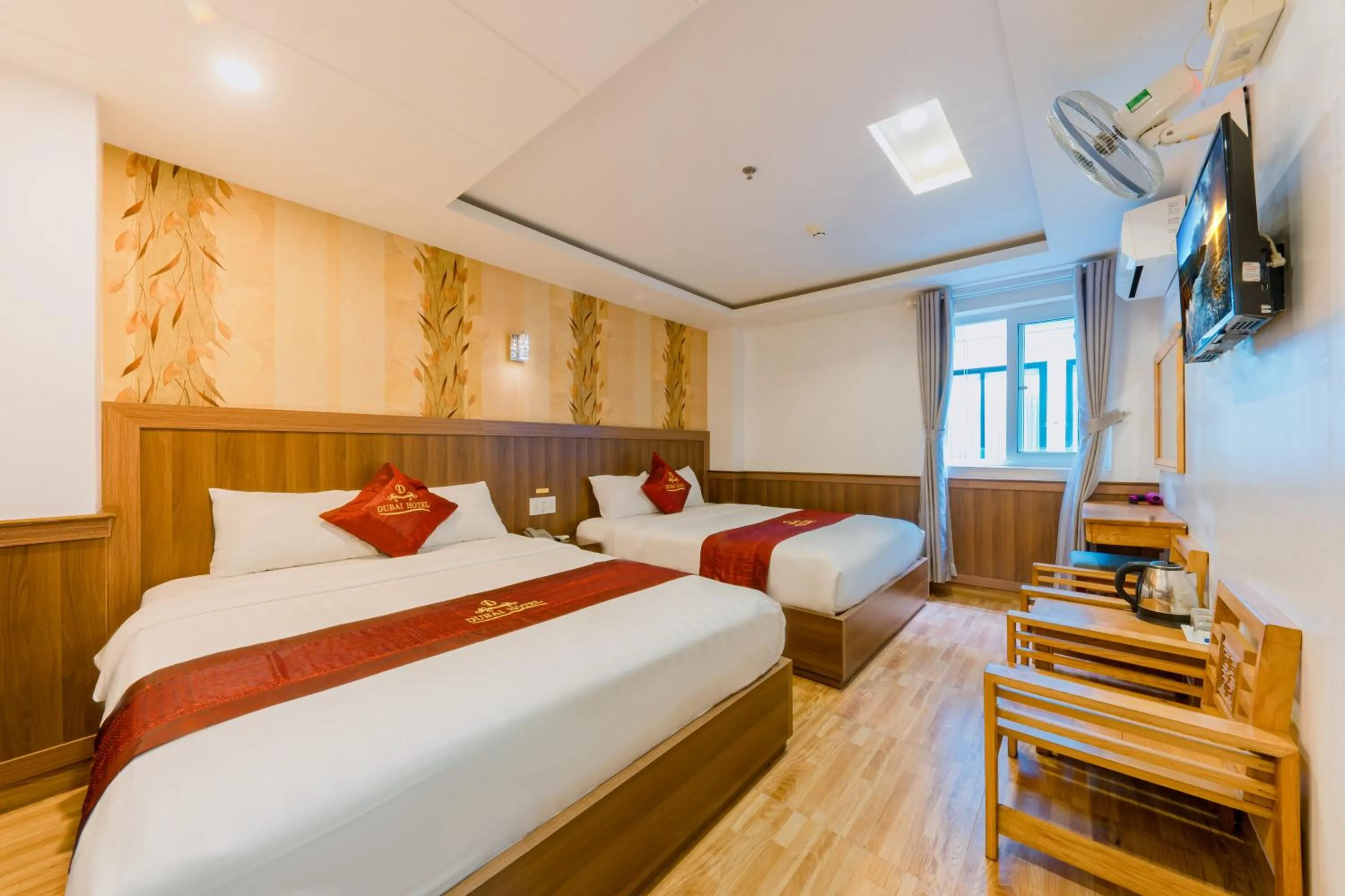 Communal lounge/ TV room, Bed in Dubai Nha Trang Hotel managed by HT