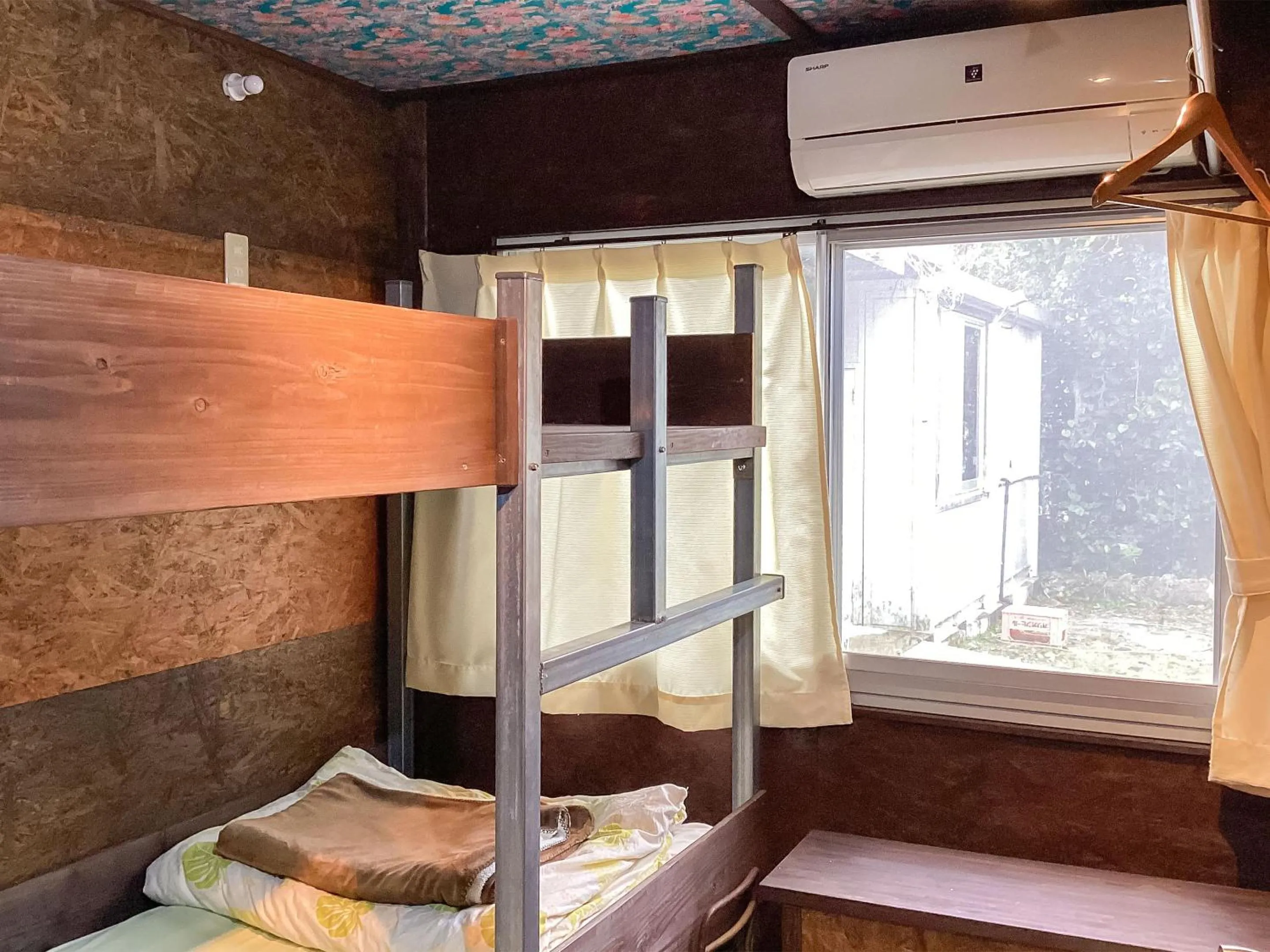 bunk bed in Sesoko Island Guest House Kafuu Village