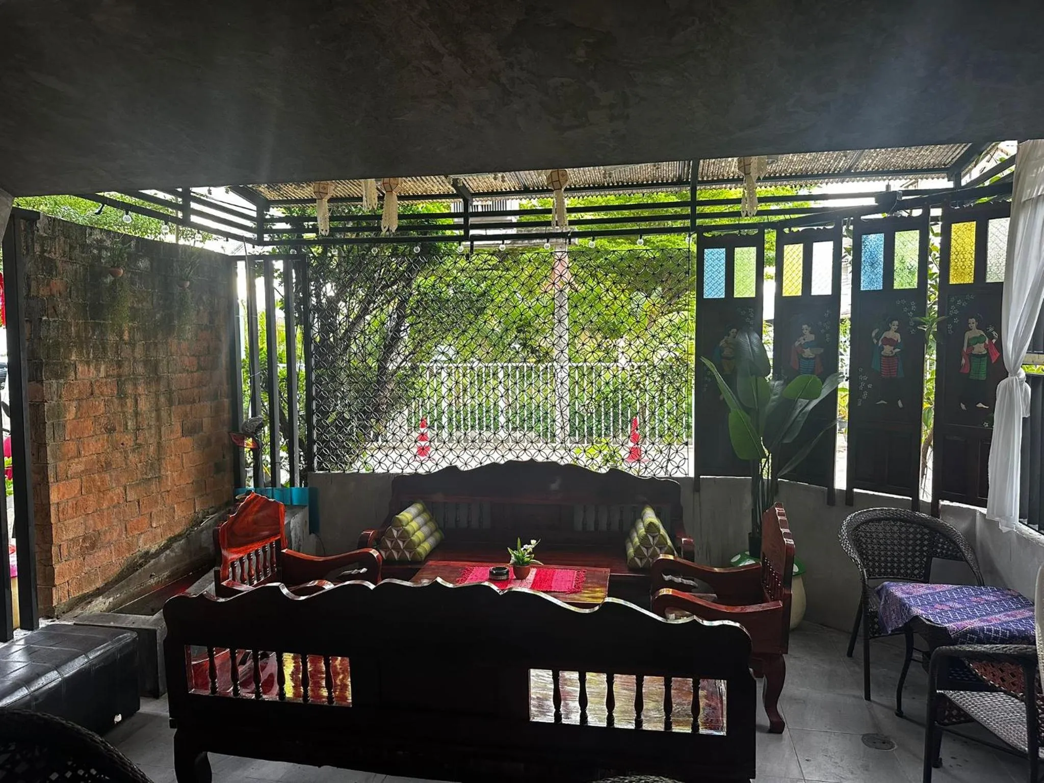 Seating area in SawasdeeCiao Patong Guesthouse