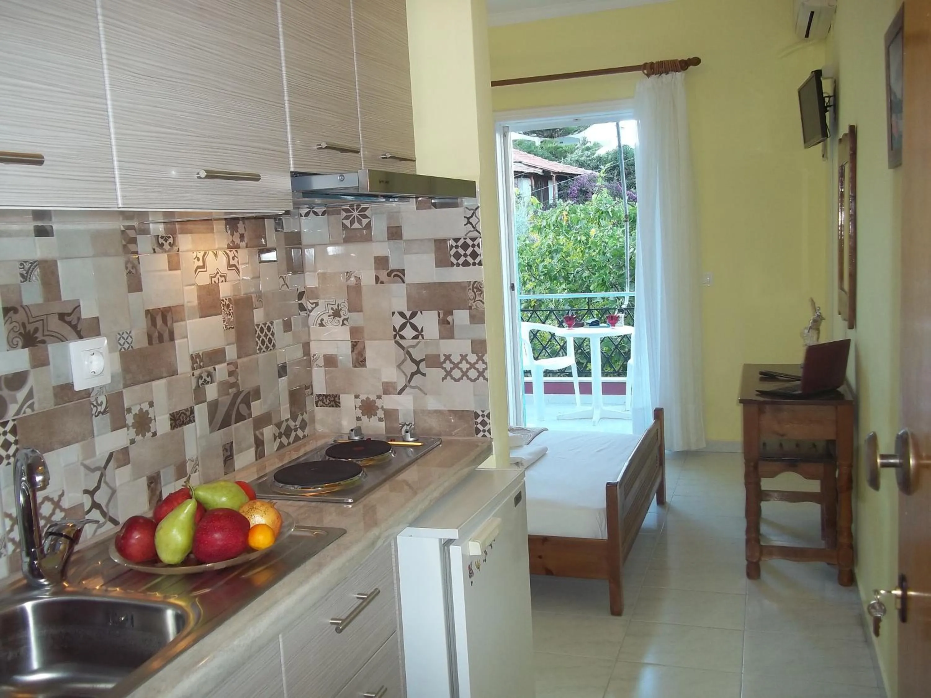 Kitchen or kitchenette in Apartments Filoxenia Zois