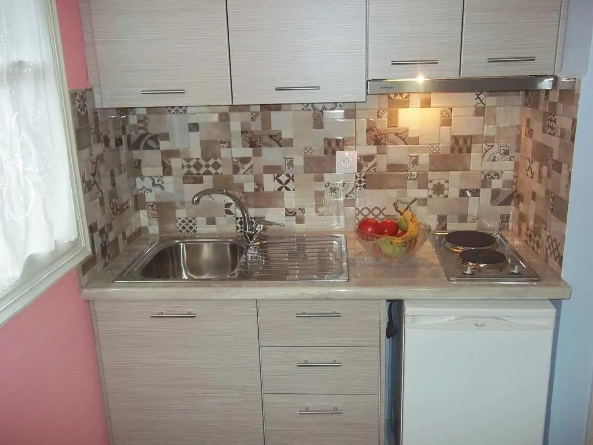 Kitchen or kitchenette in Apartments Filoxenia Zois