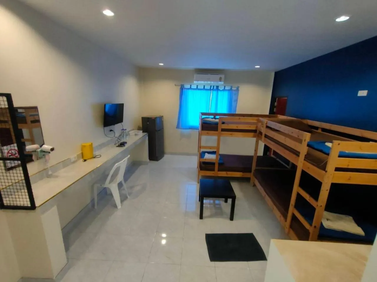 Communal lounge/ TV room, Bed in Banana Resort Sadao