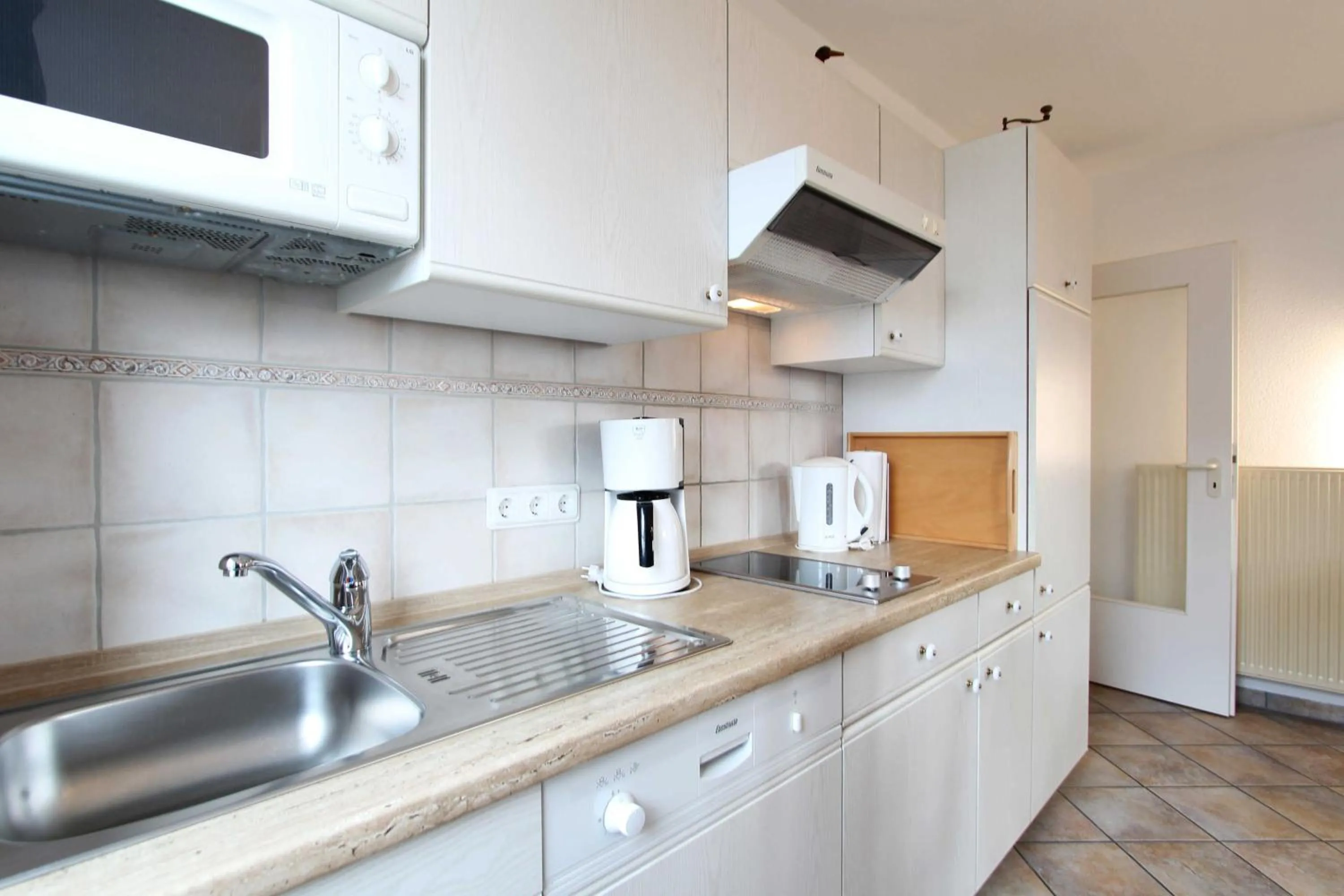 Kitchen or kitchenette in Ferienwohnung Ostseeinsel
