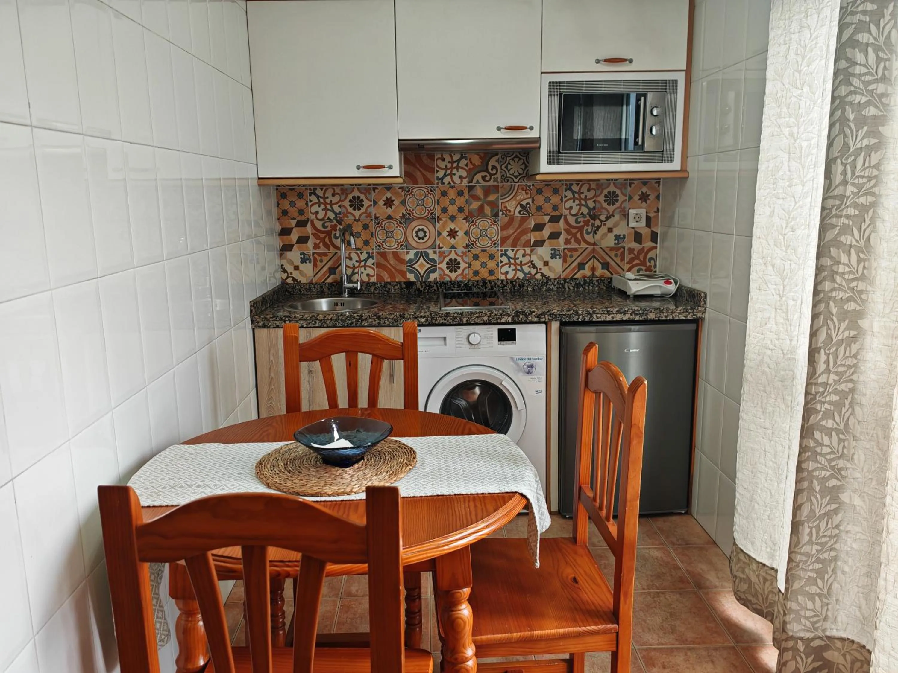kitchen in Apartamentos River Santander