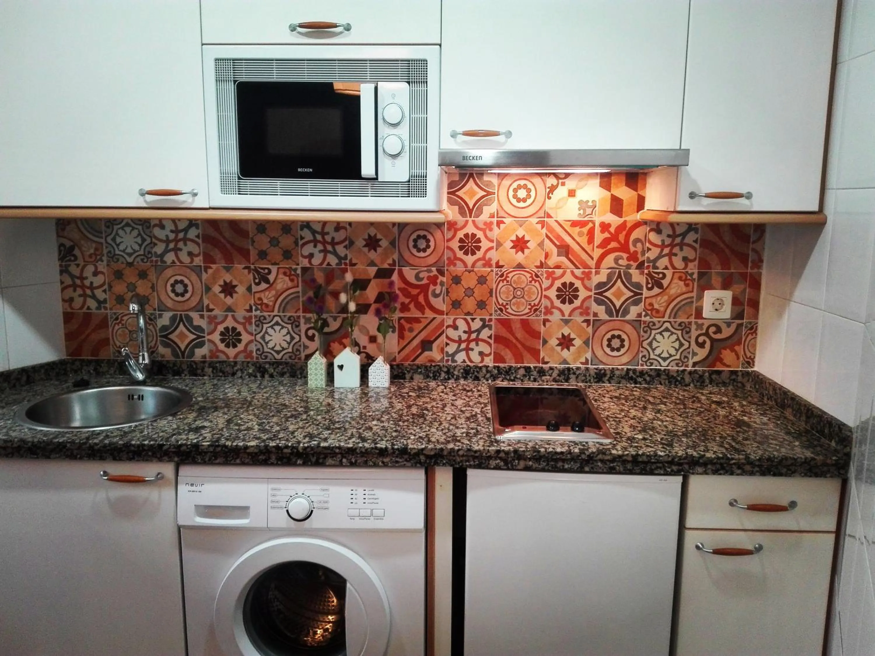 Kitchen or kitchenette in Apartamentos River Santander