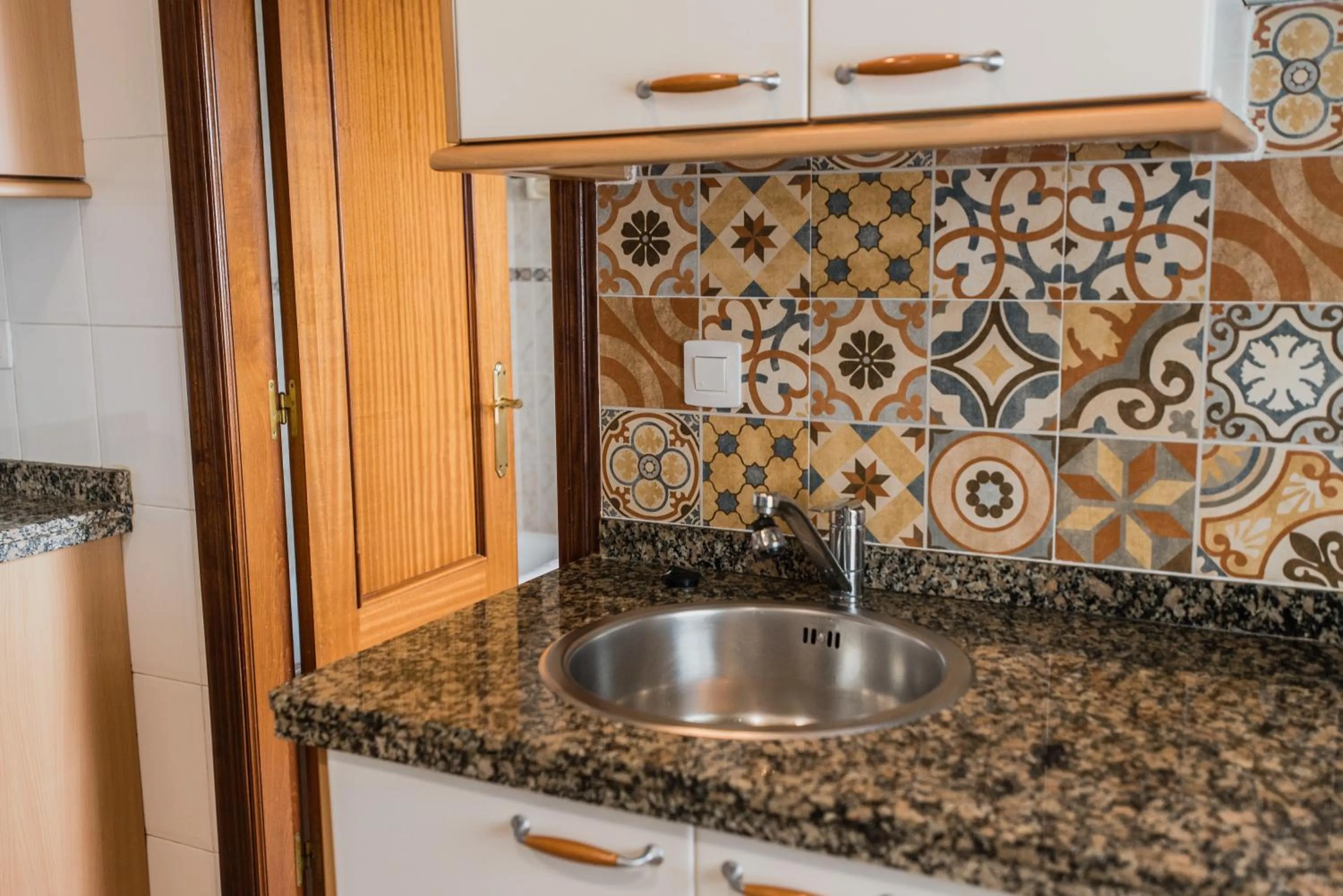 Kitchen or kitchenette in Apartamentos River Santander