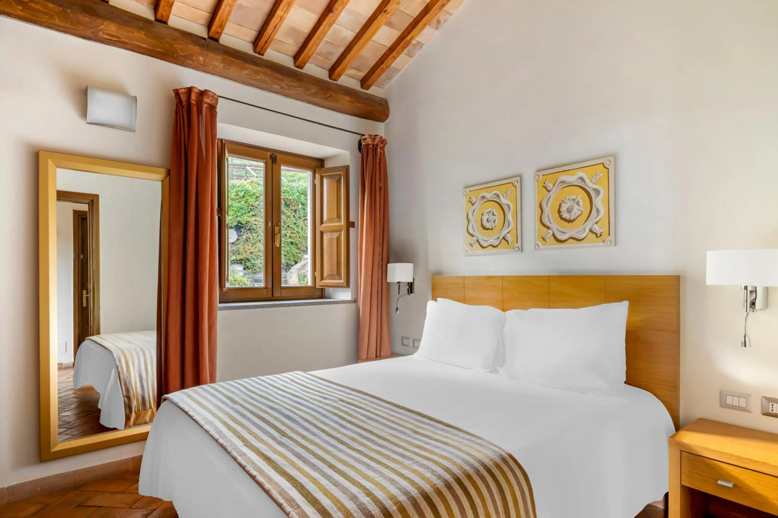 Bed in Palazzo Catalani Resort