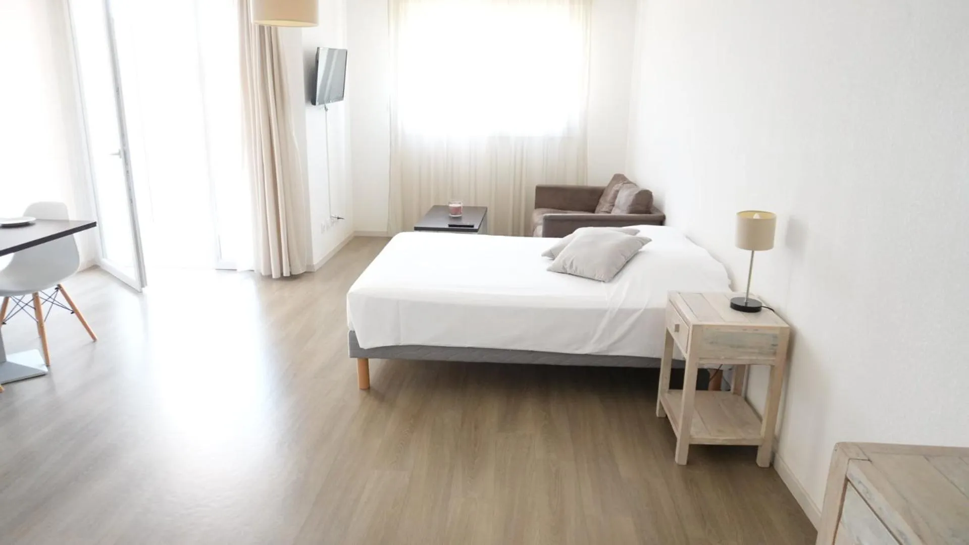 Bed in Zenao Appart'Hotel