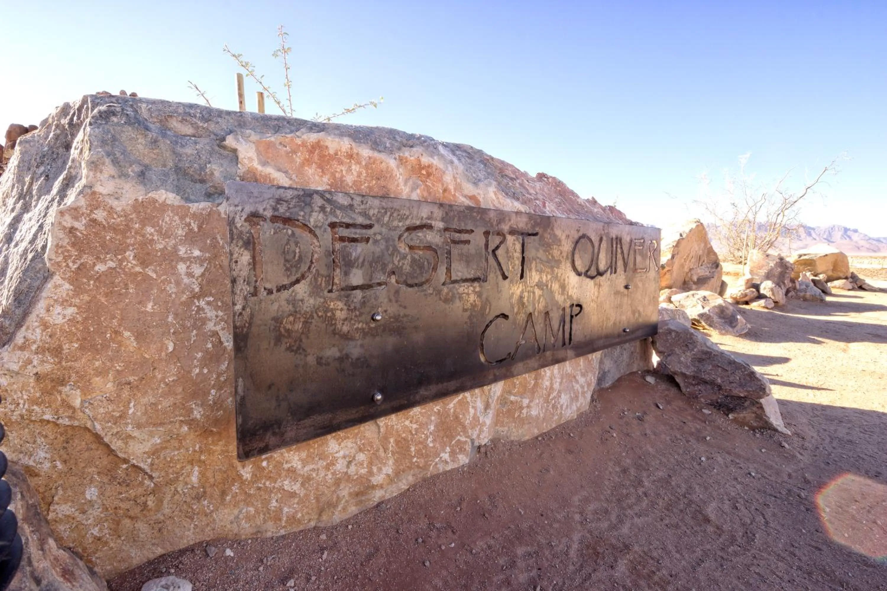 Property logo or sign in Desert Quiver Camp