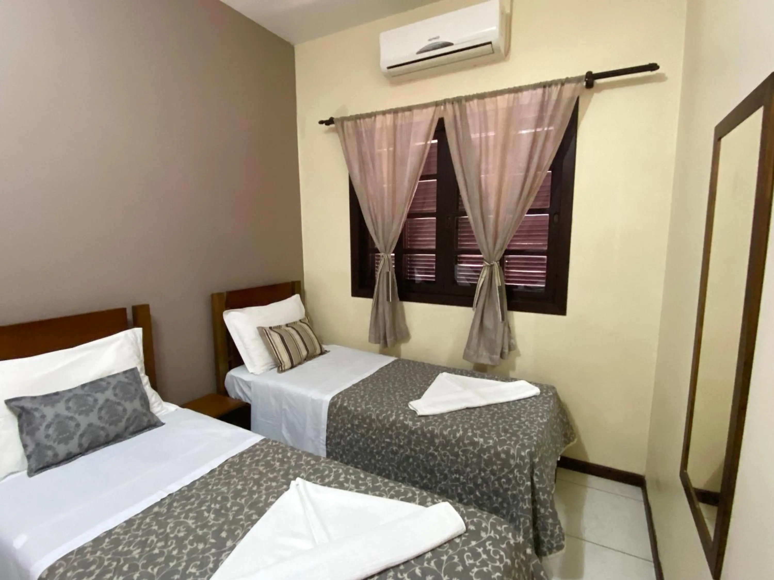 Bed in Pousada Canasvieiras