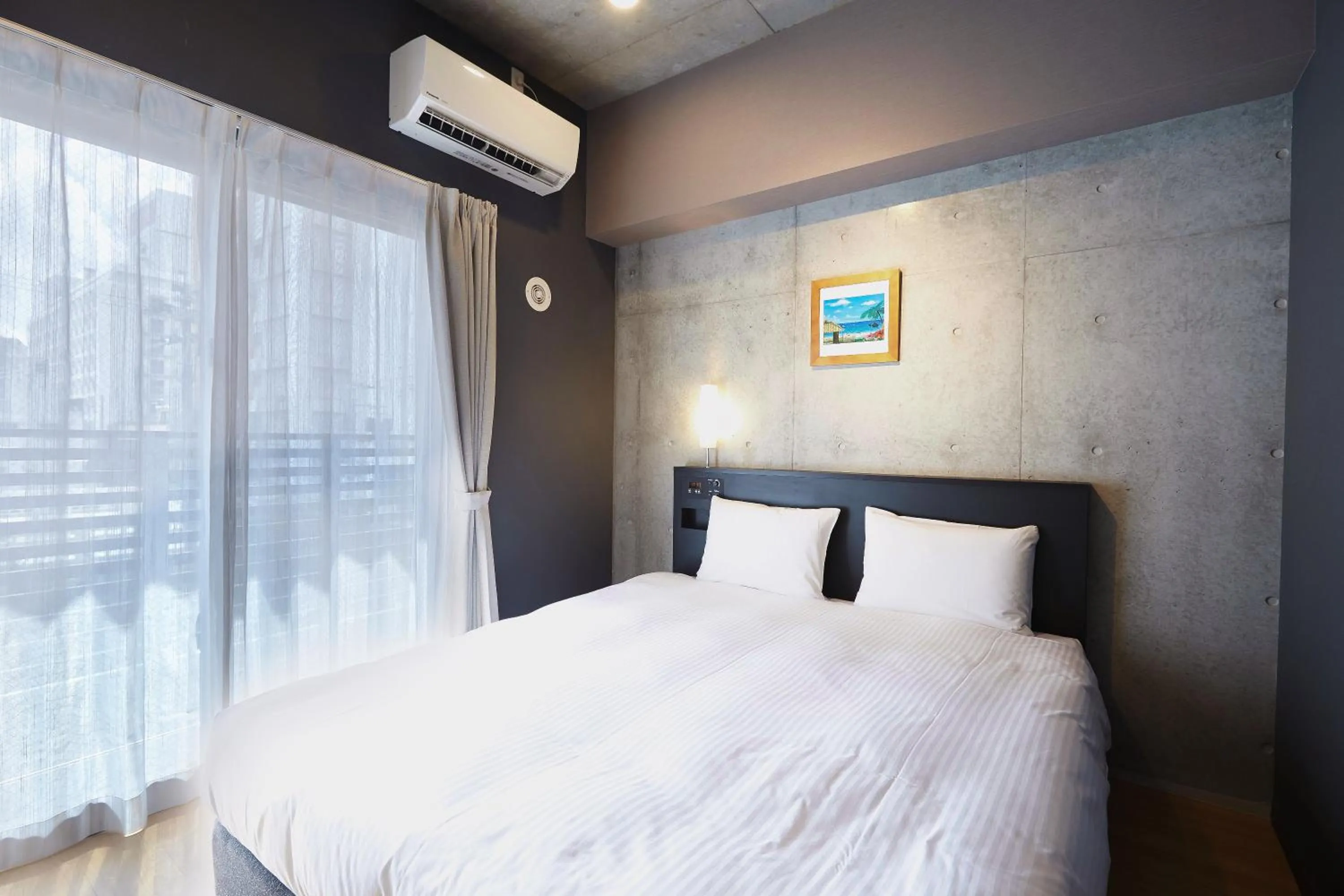 Photo of the whole room, Bed in NAHA-WEST INN