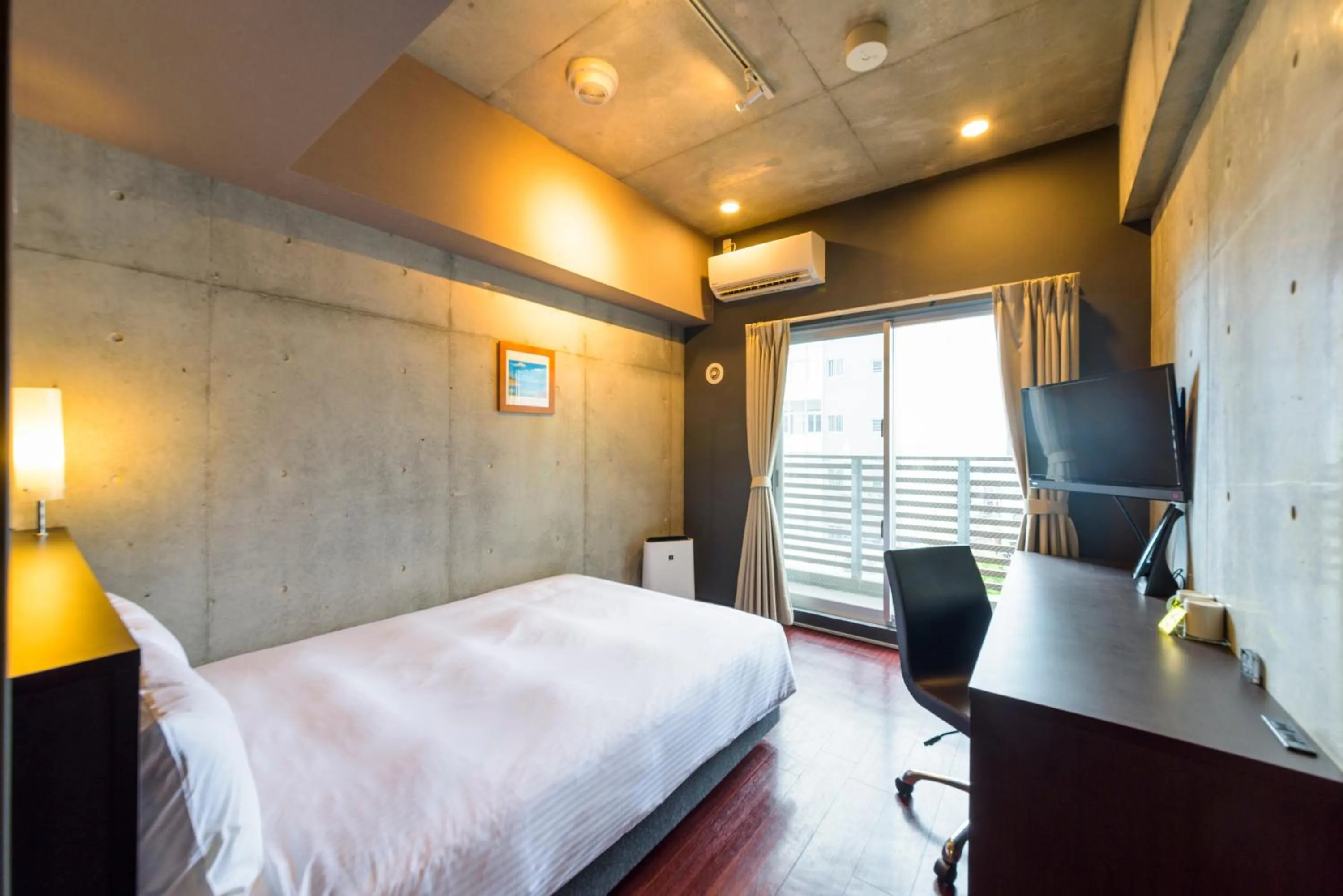 Photo of the whole room, Bed in NAHA-WEST INN