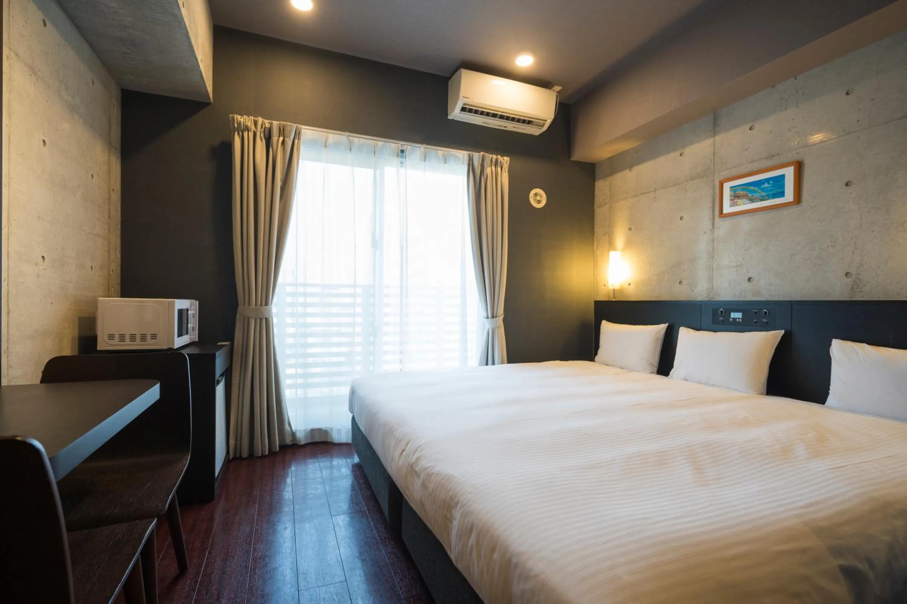 Photo of the whole room, Bed in NAHA-WEST INN