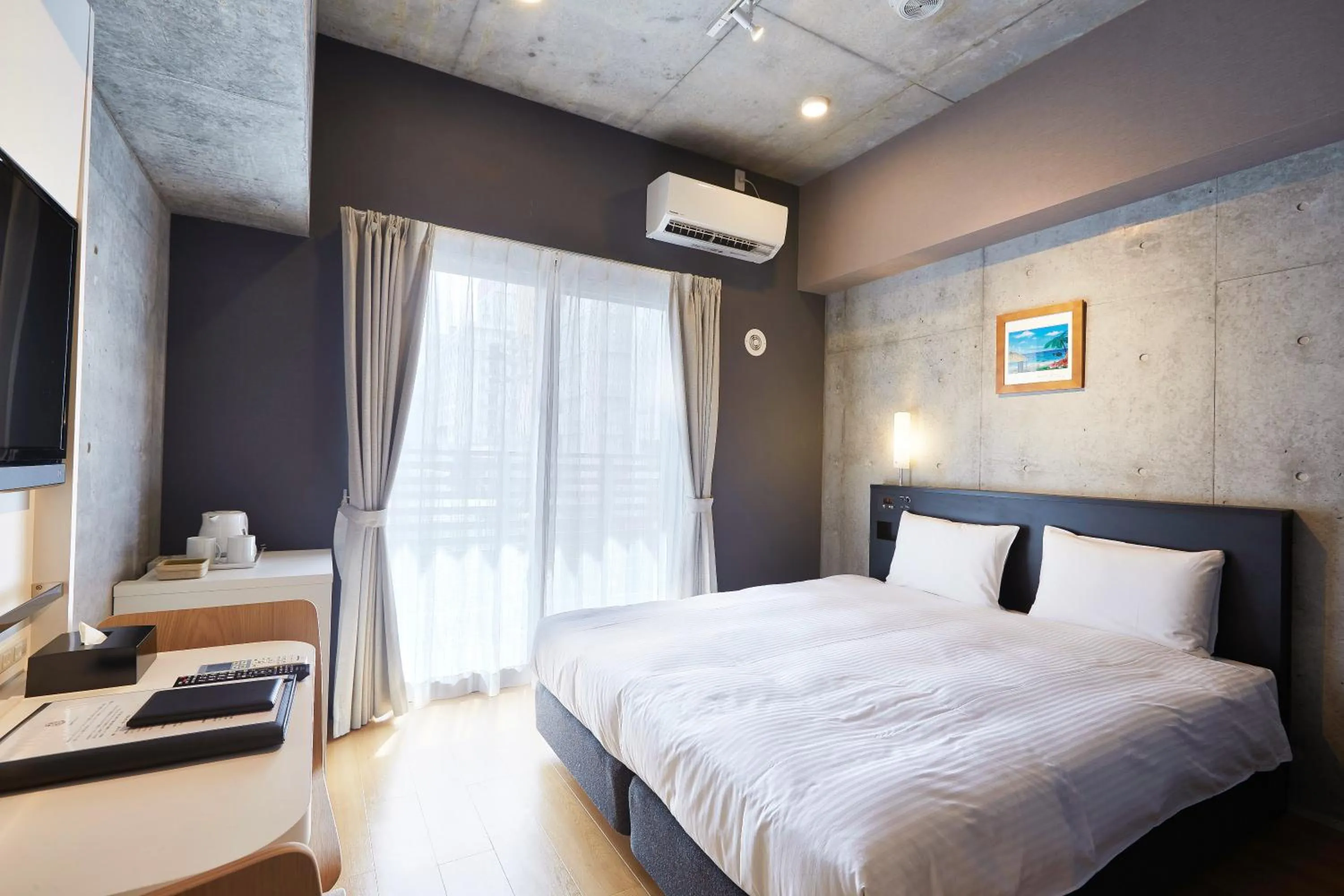 Living room, Bed in NAHA-WEST INN