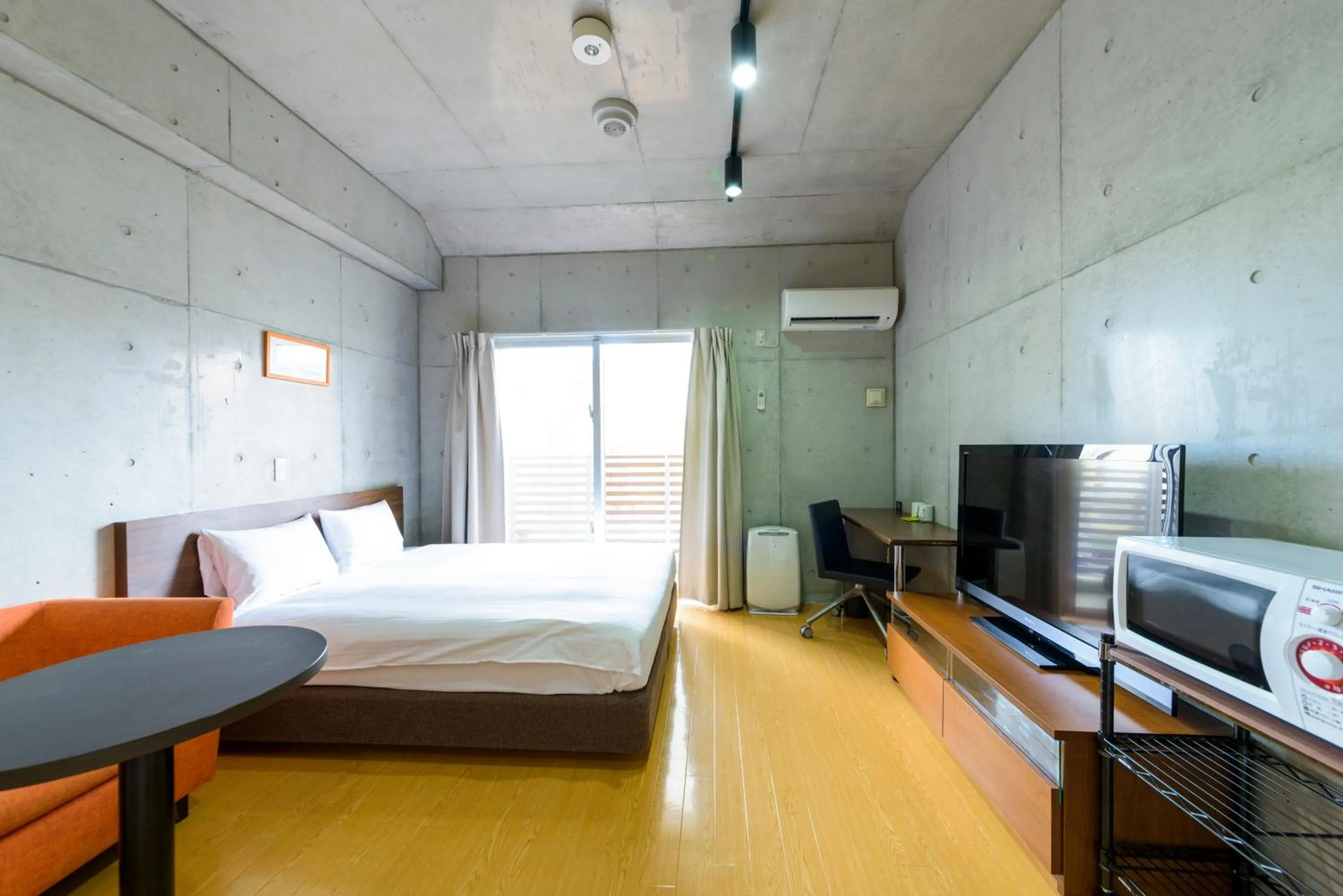 Photo of the whole room, Bed in NAHA-WEST INN