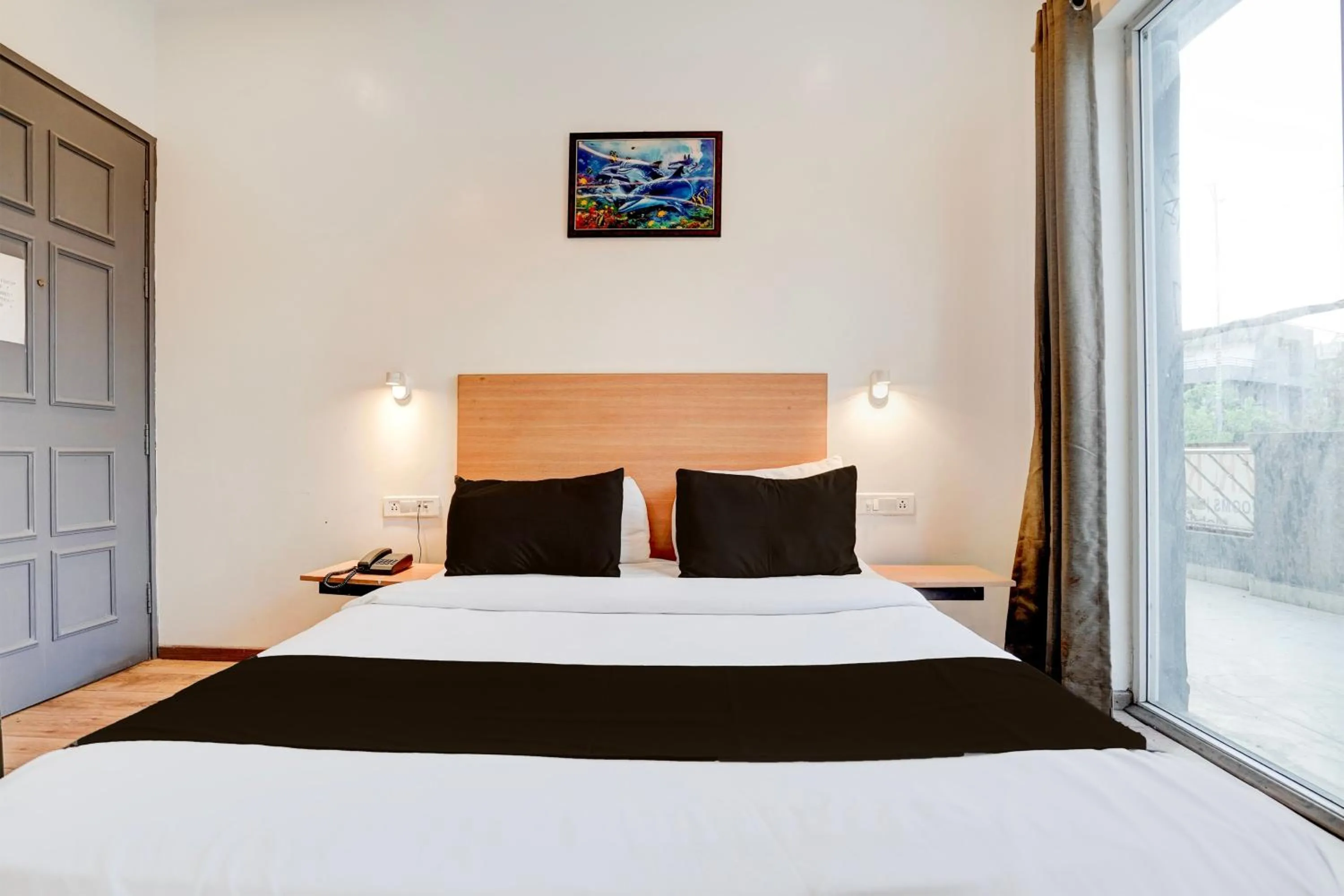 Bedroom in Super Hotel O Britania Chowk