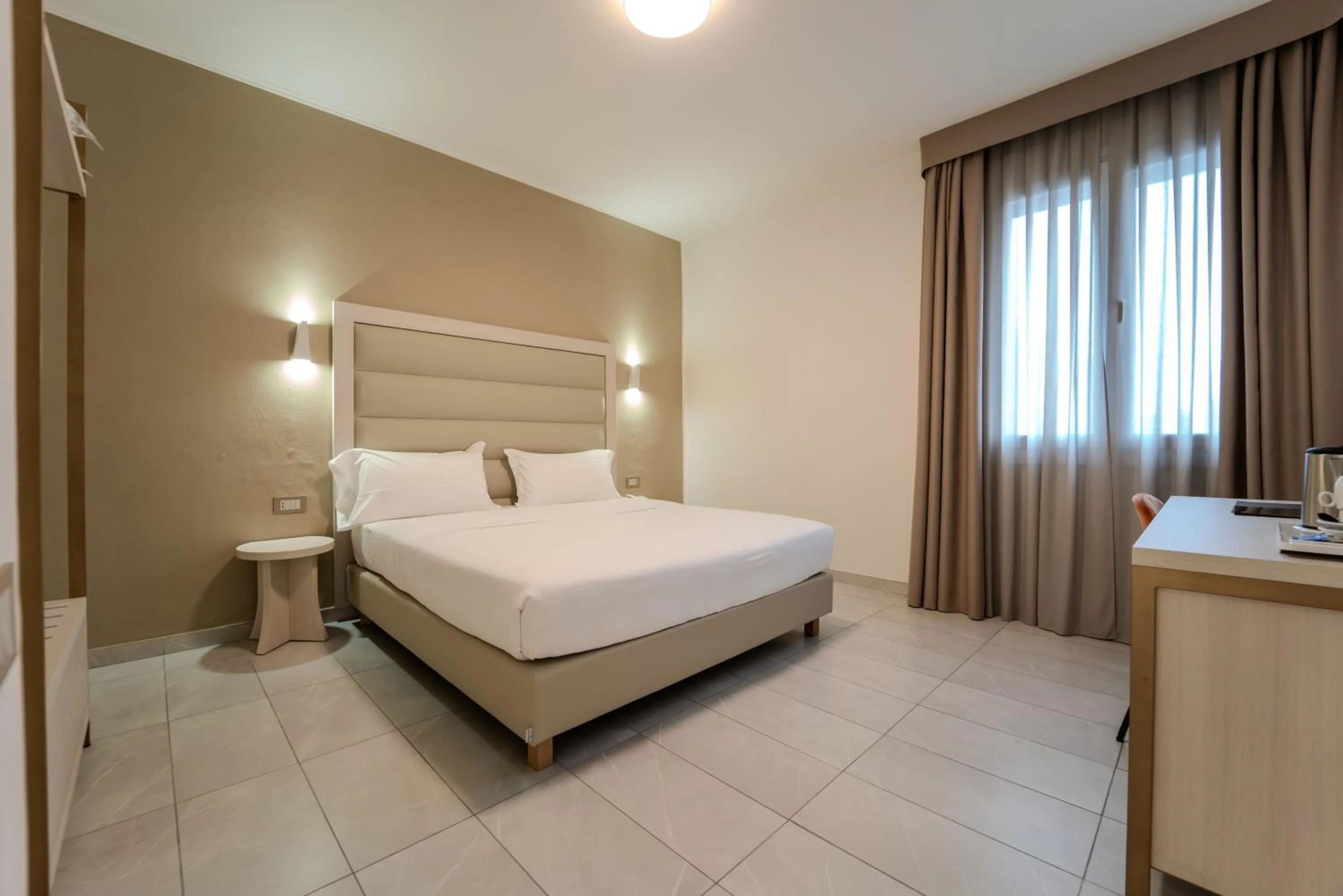 Bed in Hotel Donatello