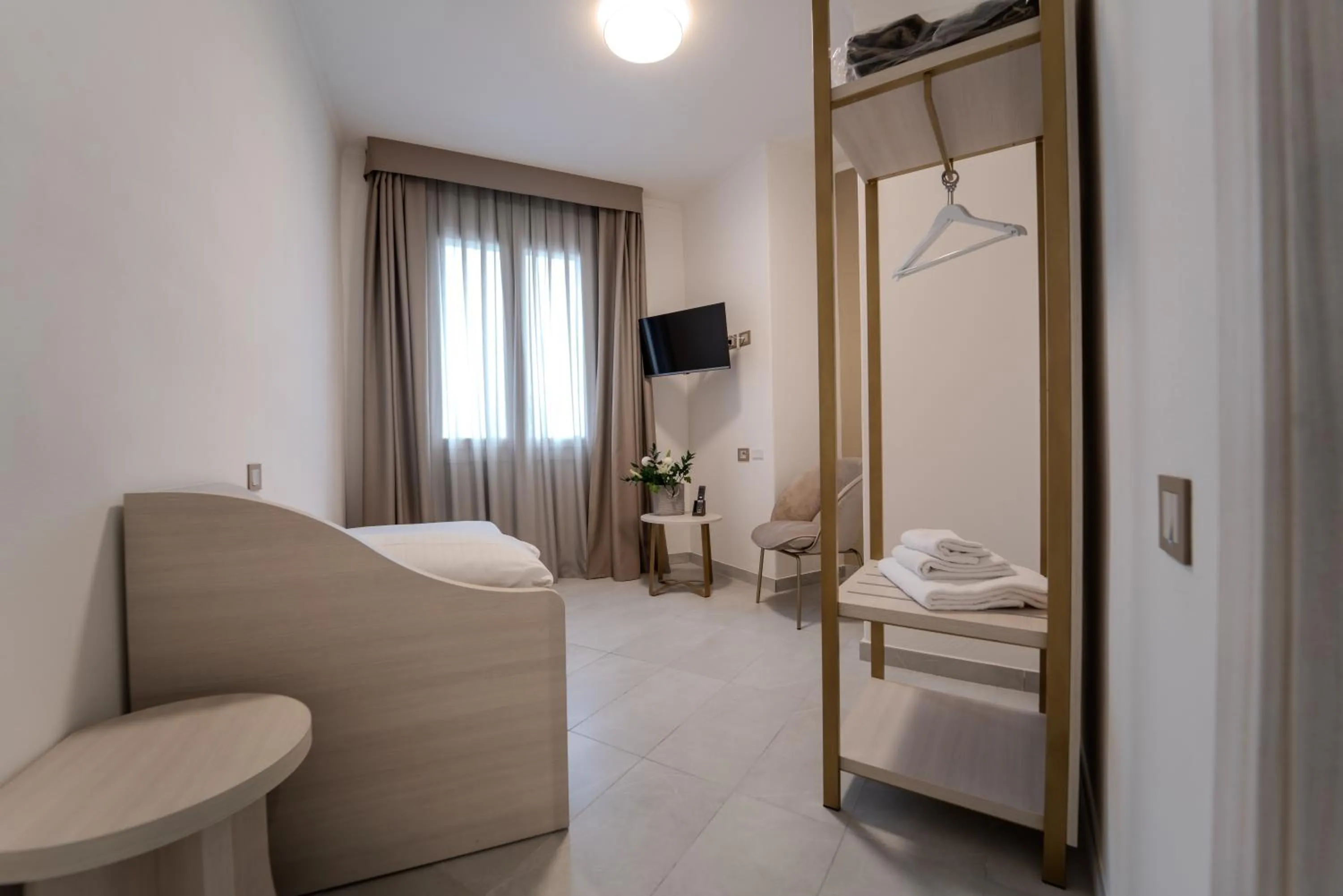 Bed in Hotel Donatello