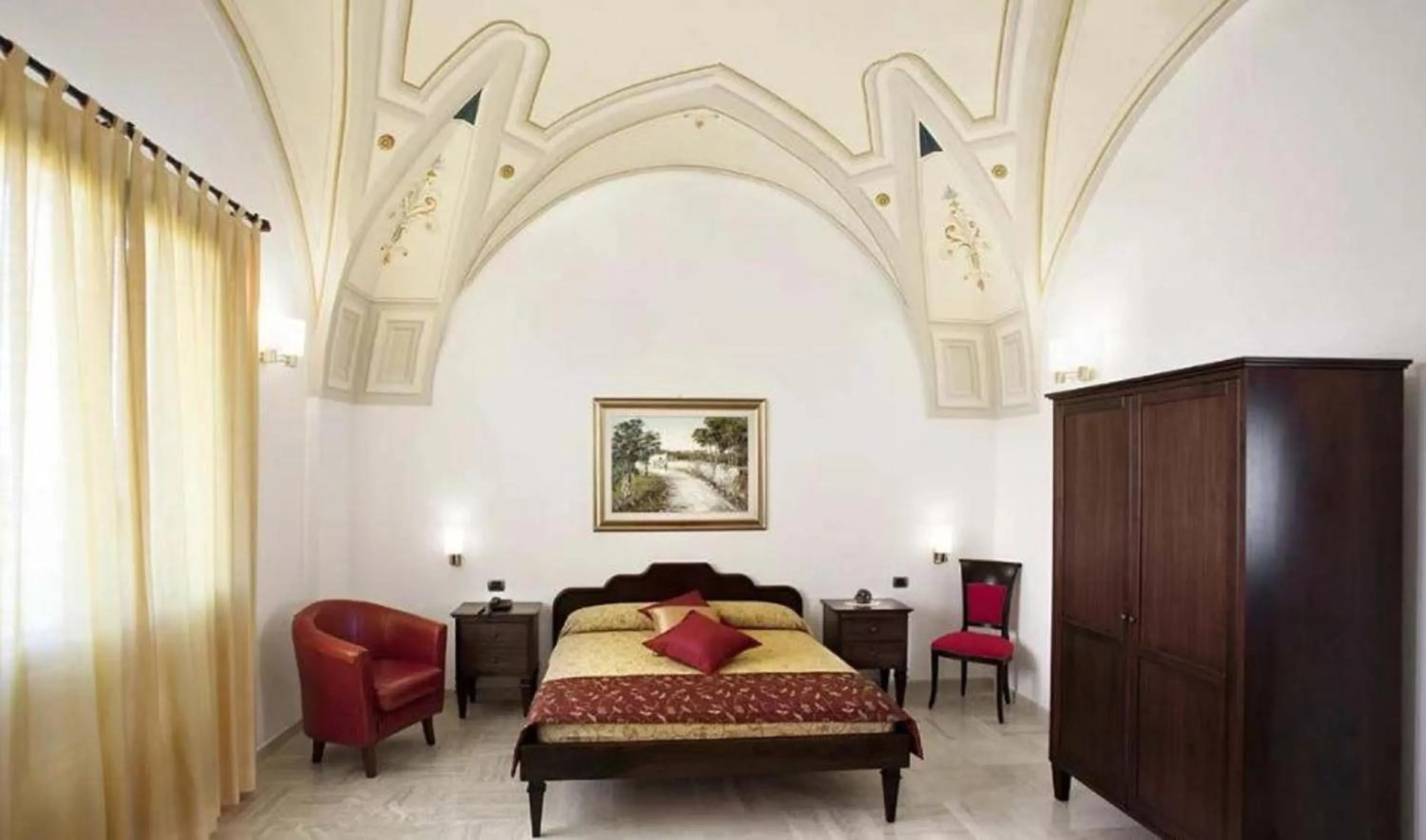 Bedroom in AmareGold Tenuta La Baronessa Resort