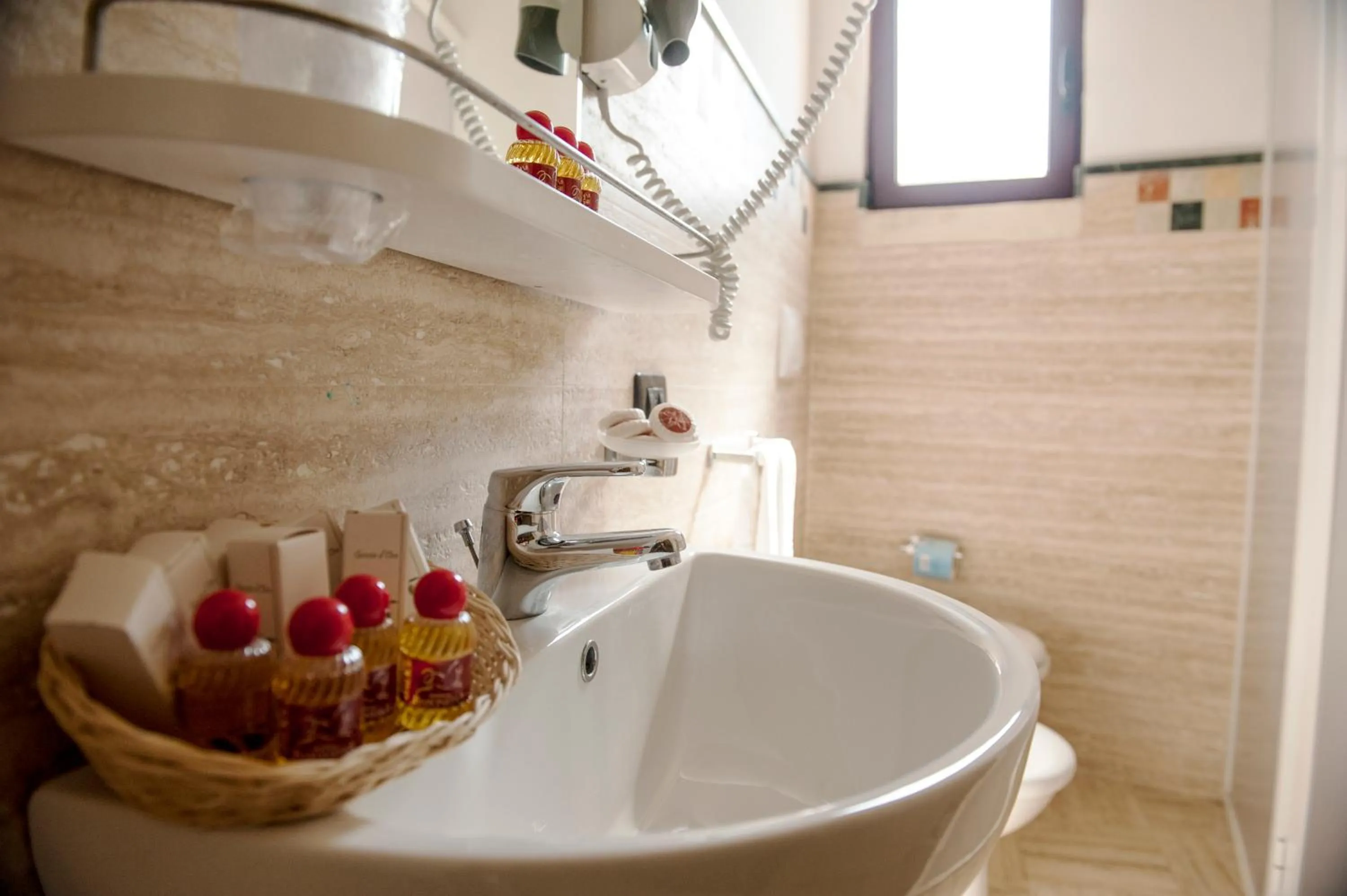 Bathroom in AmareGold Tenuta La Baronessa Resort