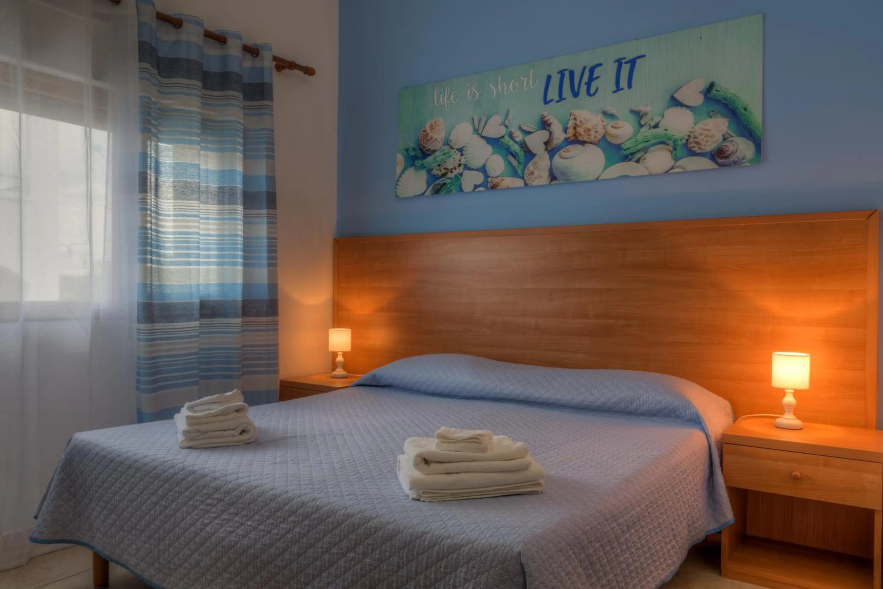 Photo of the whole room, Bed in Aquarium Residence