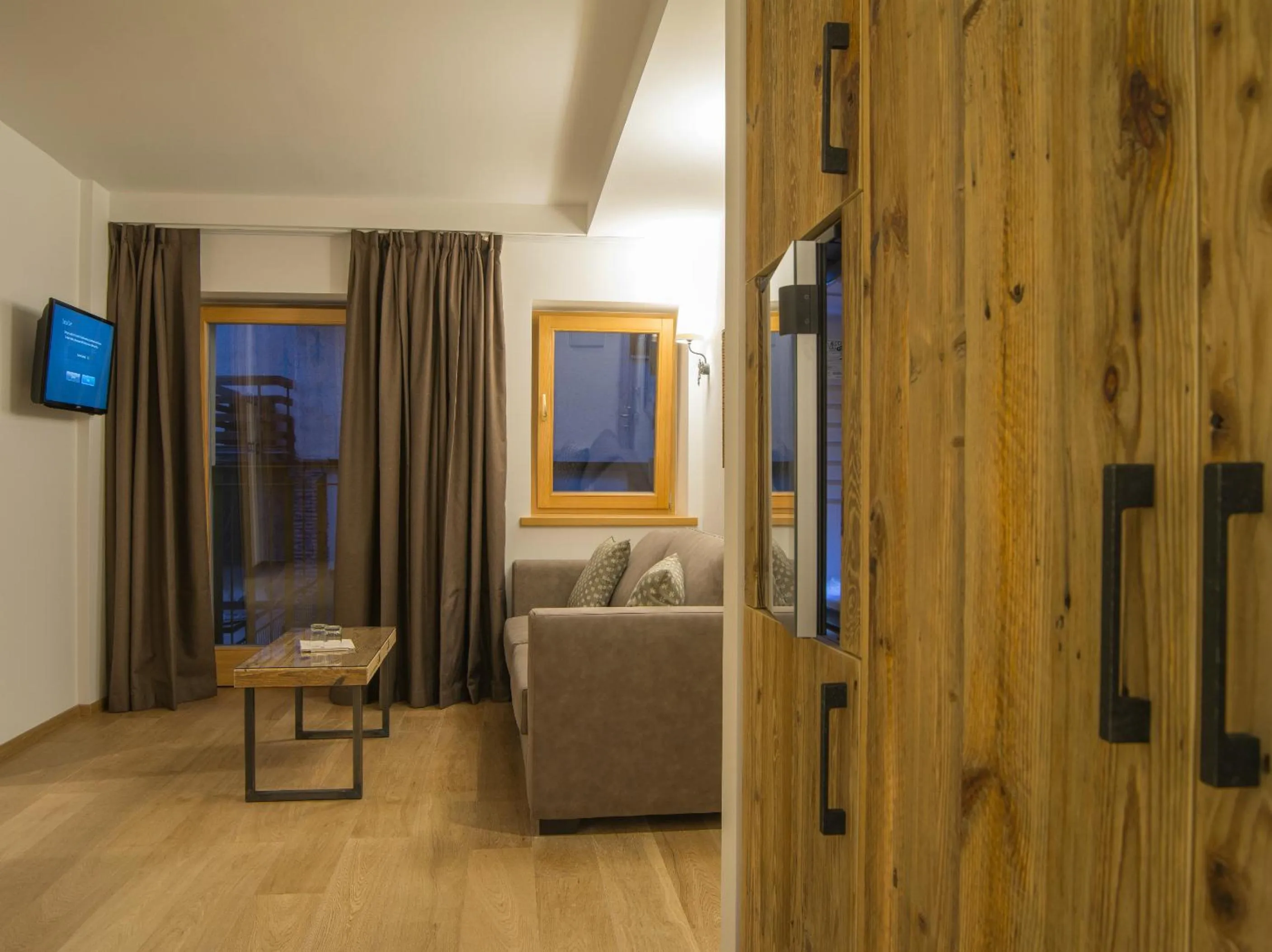 Living room in Hotel Garnì Caminetto