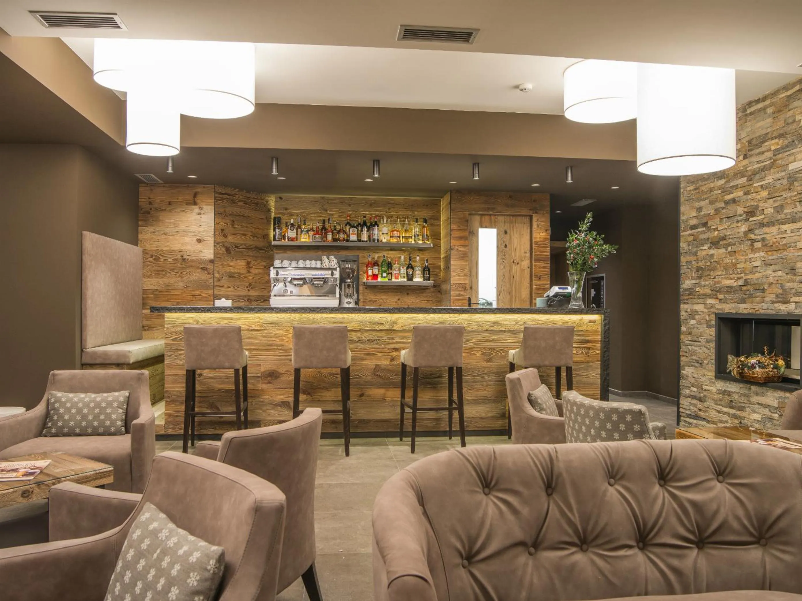Lounge or bar in Hotel Garnì Caminetto