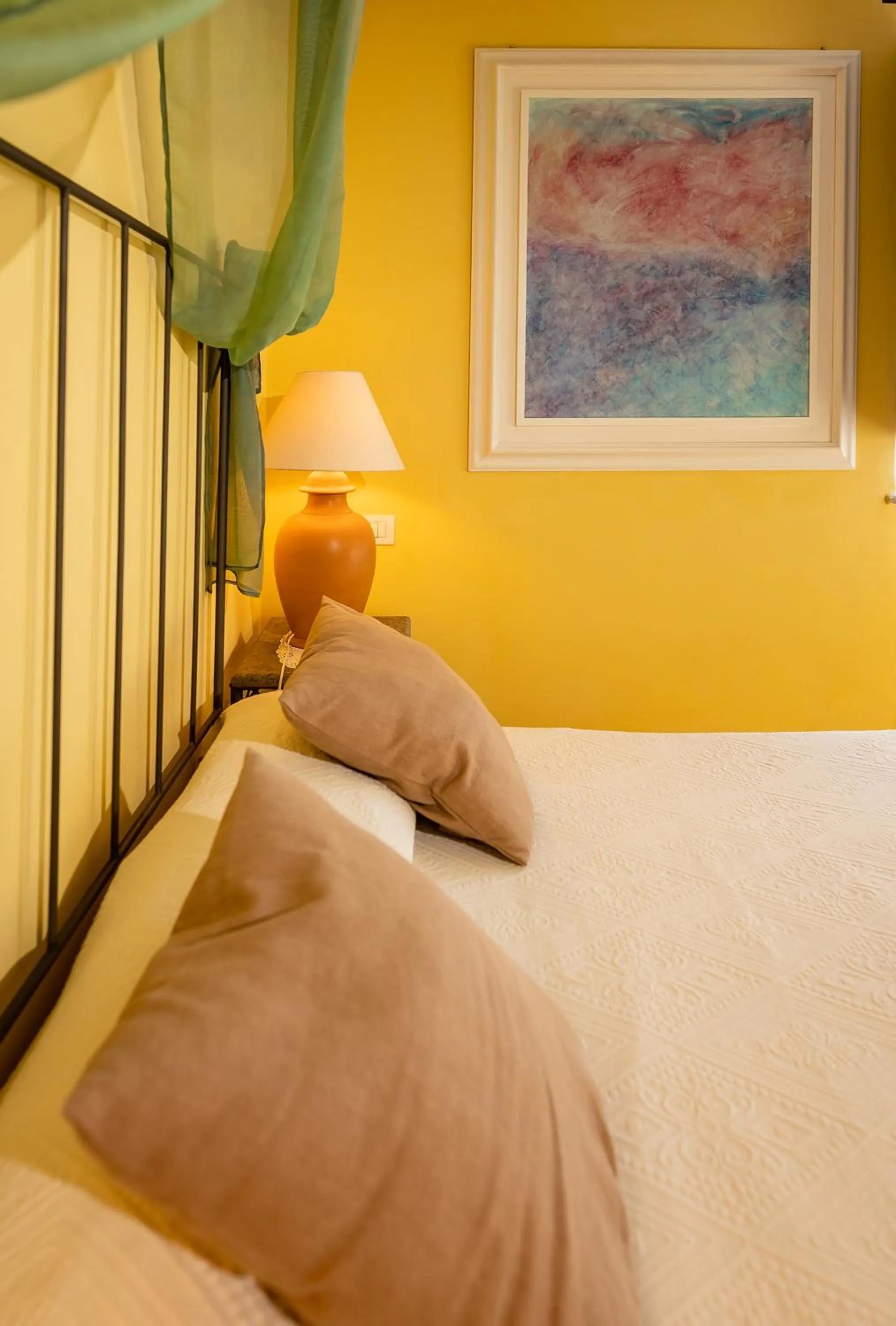 Bed in Marulivo Hotel