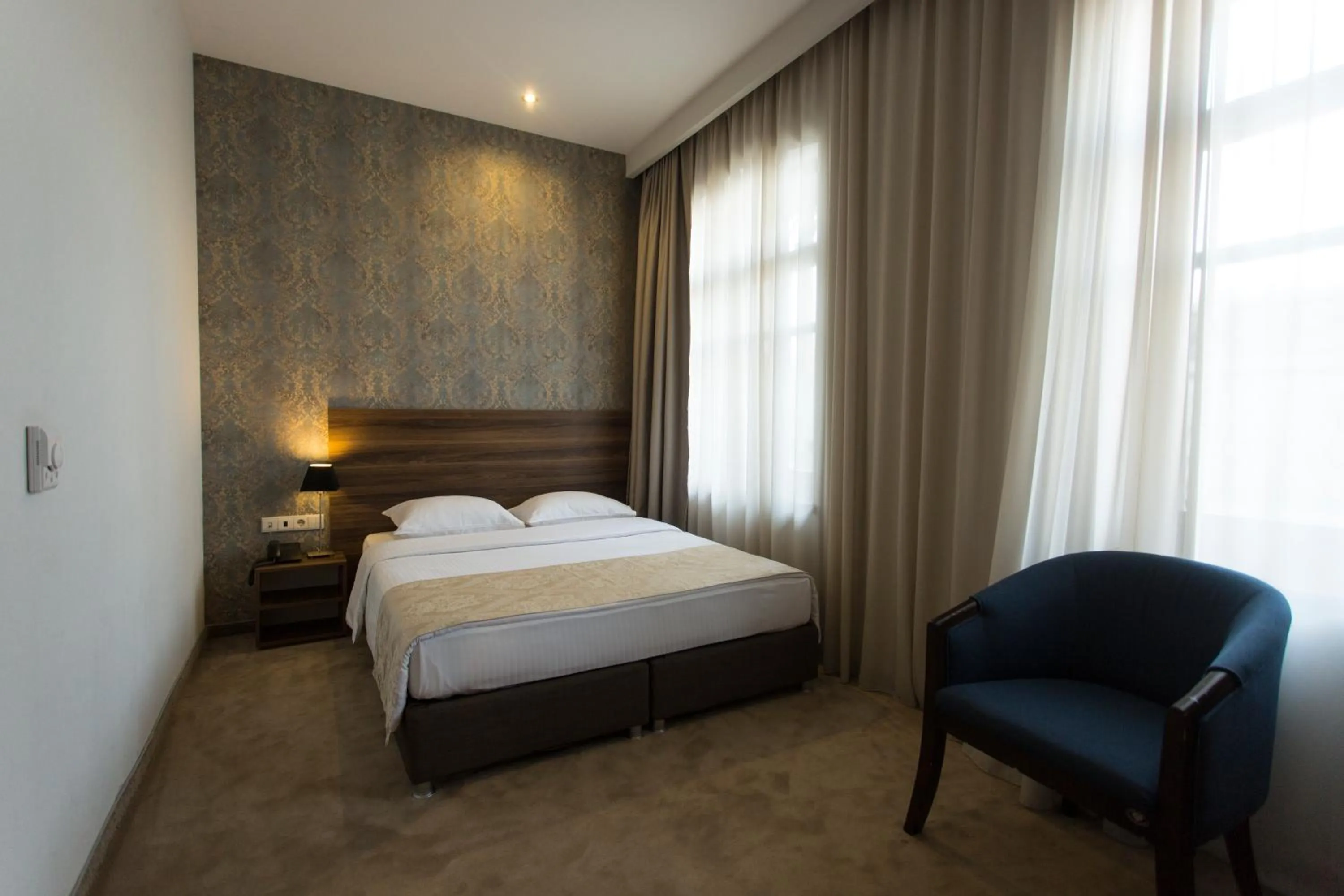 Photo of the whole room, Bed in Old Meidan Tbilisi By Urban Hotels
