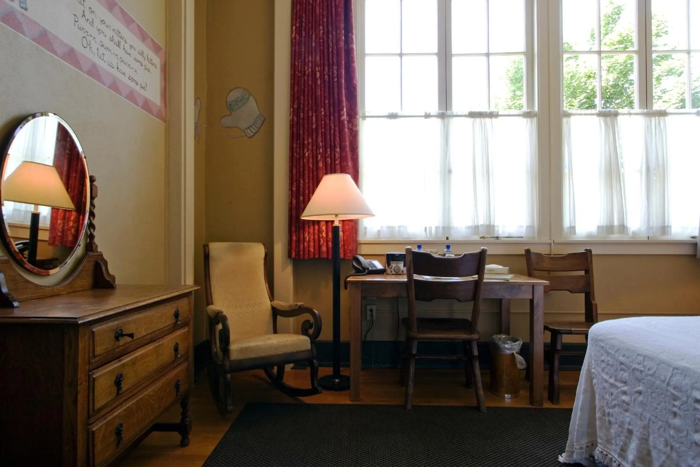 Seating area, Bed in McMenamins Kennedy School