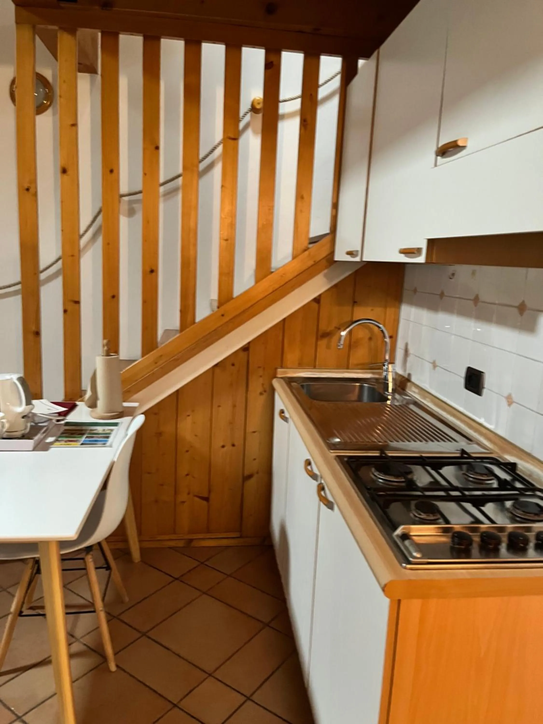 Kitchen or kitchenette in Manci Apartments by Hotel America