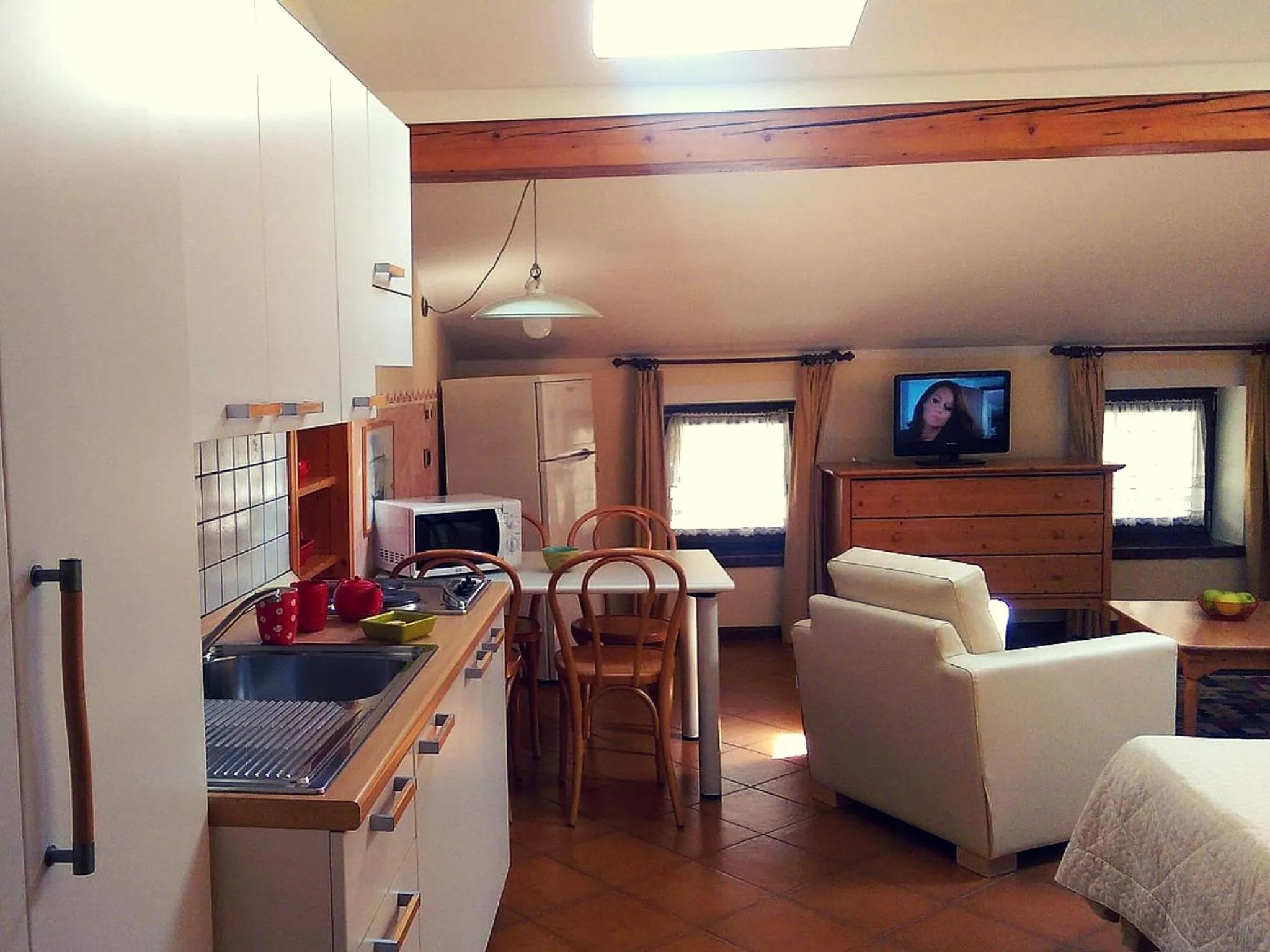 TV and multimedia in Manci Apartments by Hotel America