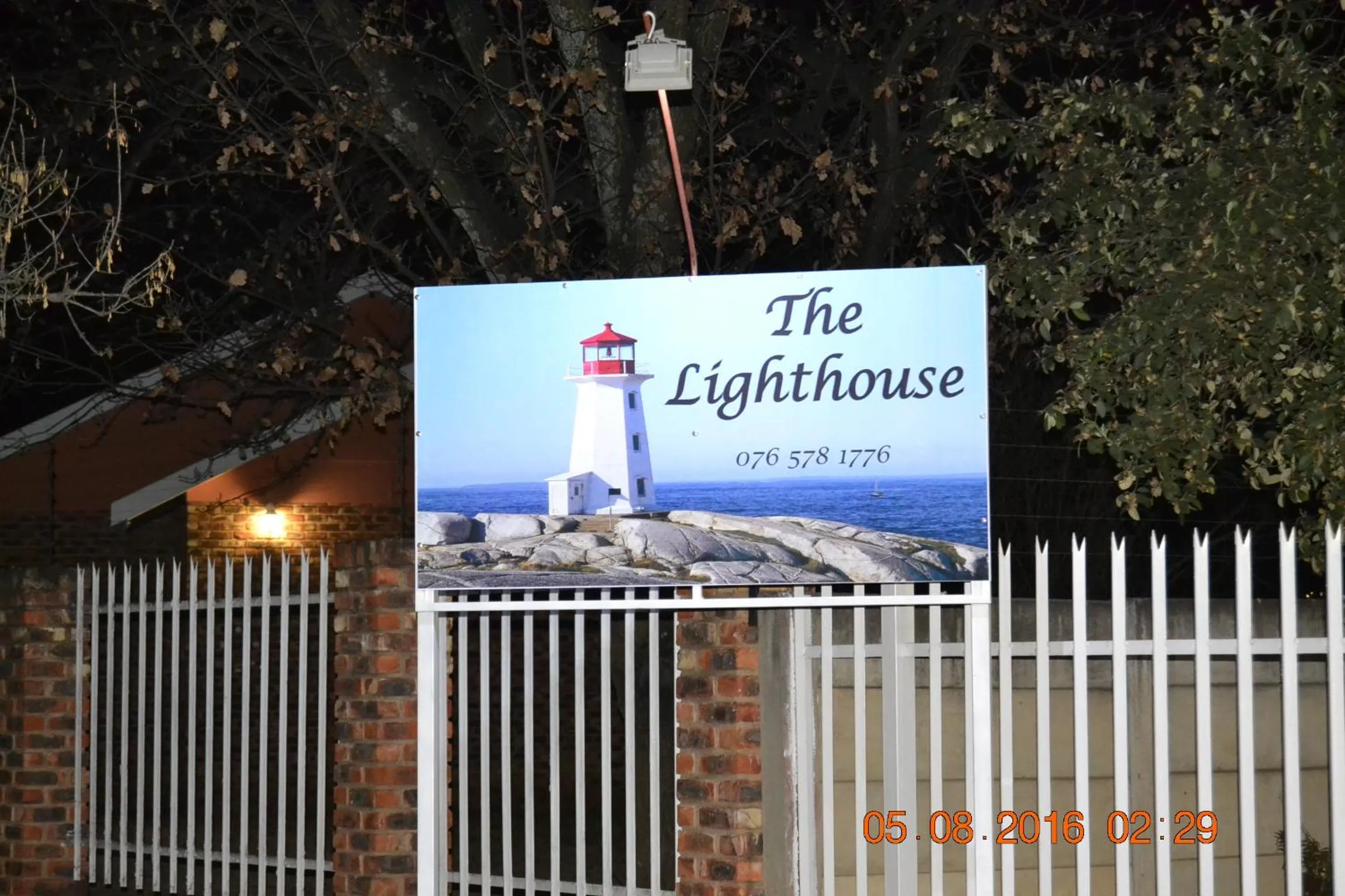 Property logo or sign in The Lighthouse Guesthouse