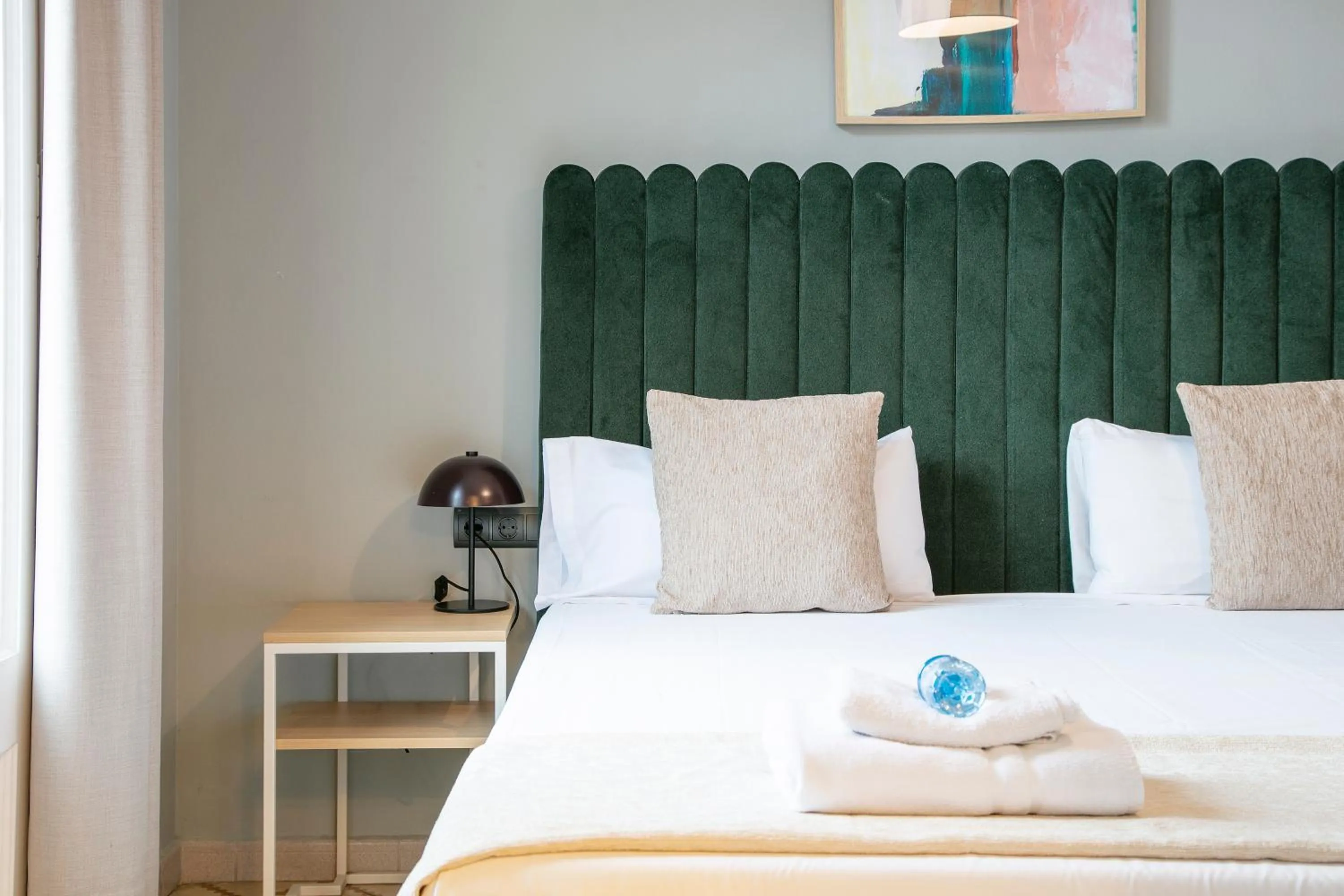 Bedroom, Bed in Numa I Caja Apartments